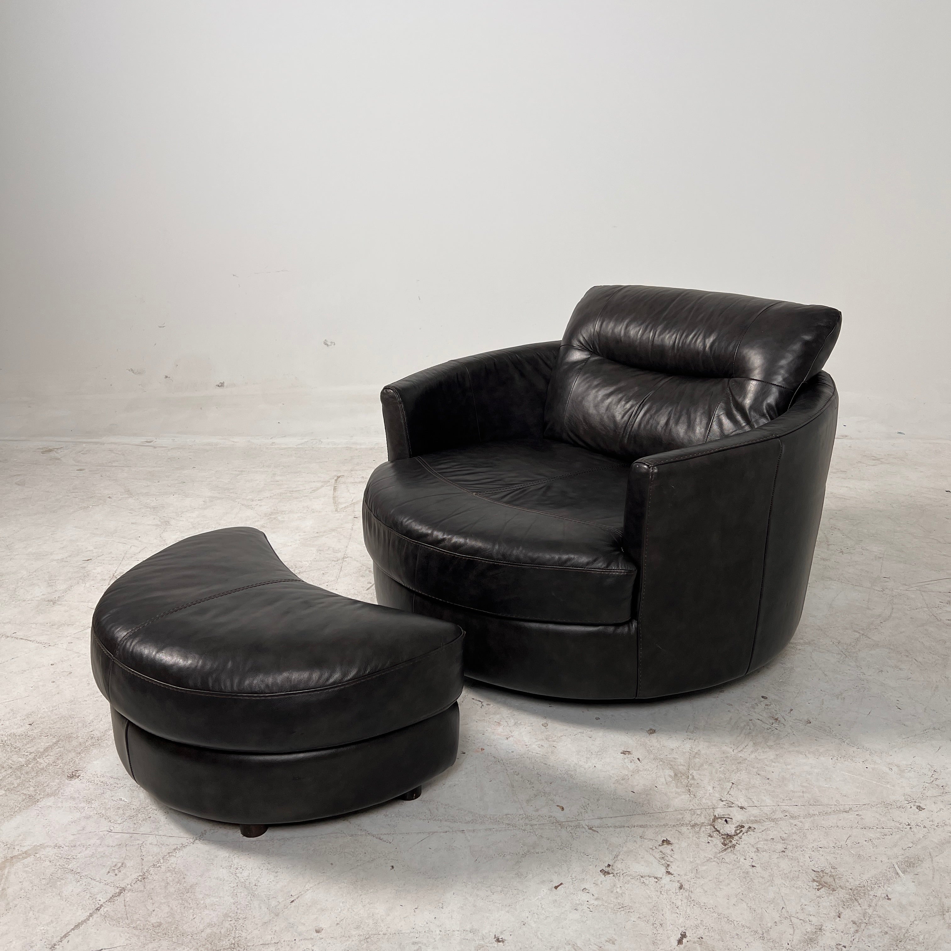 Urban Barn cuddler chair + ottoman. Leather round chair. Delivery available