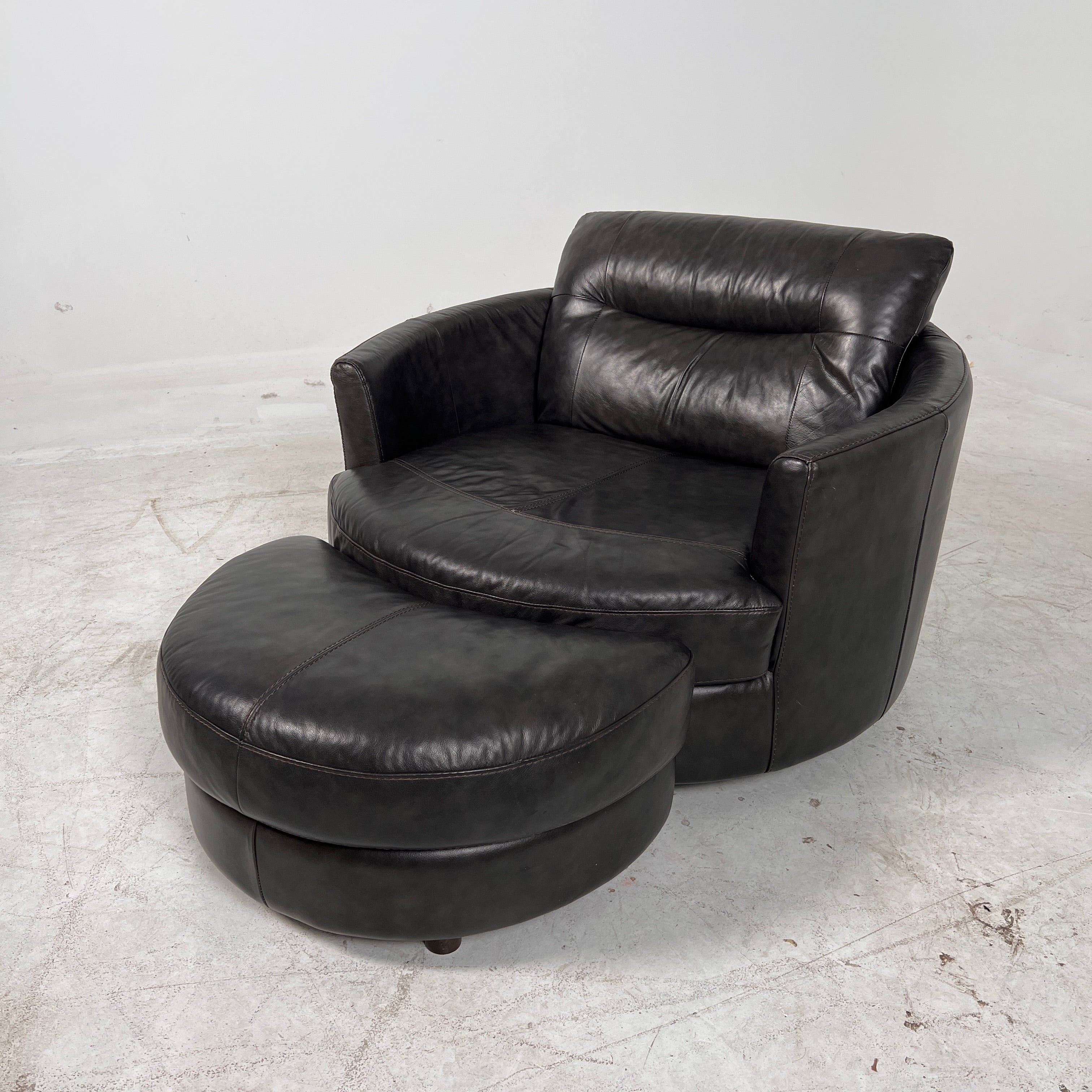 Urban Barn cuddler chair + ottoman. Leather round chair. Delivery available
