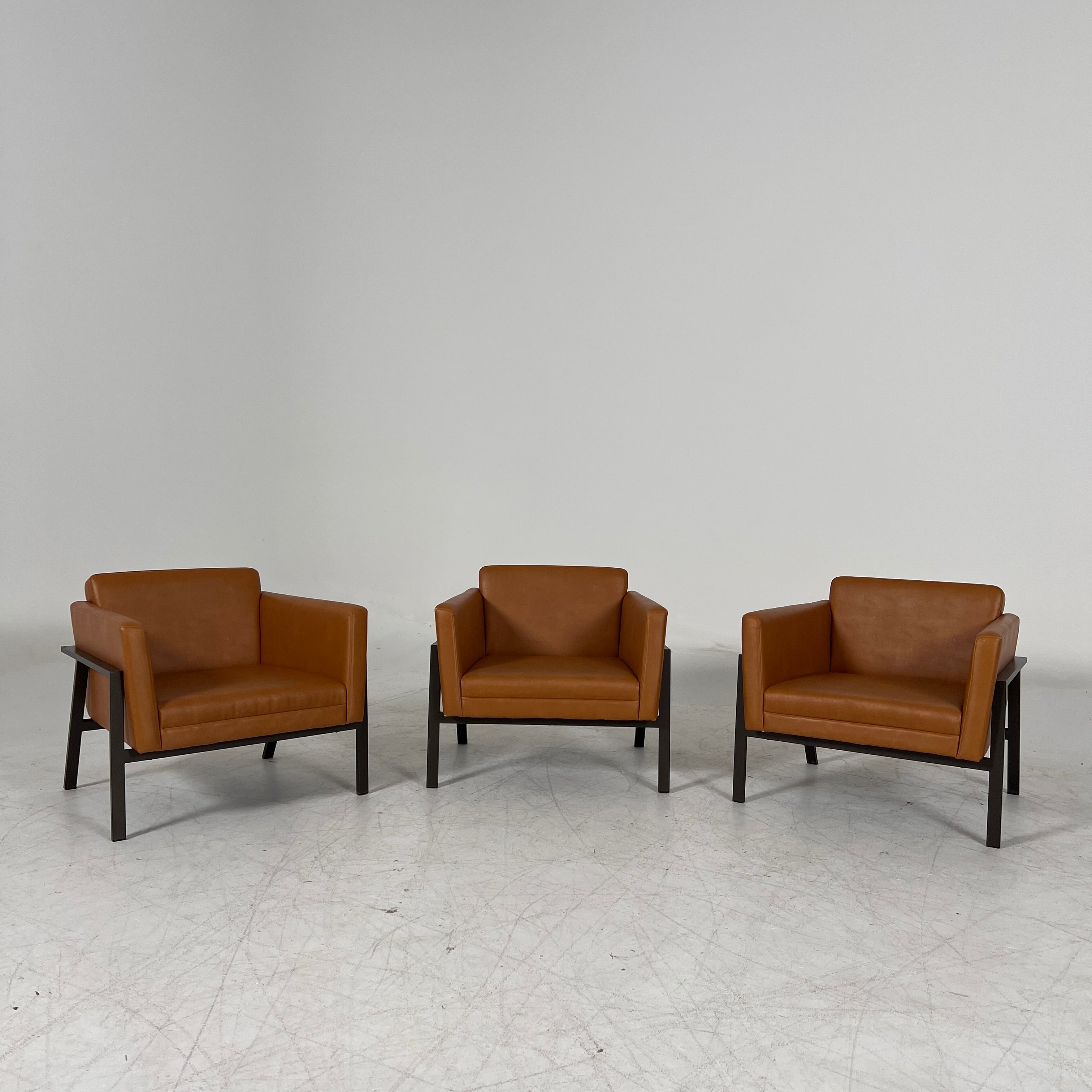 Cognac Armchairs. Faux leather and metal chairs. Delivery available