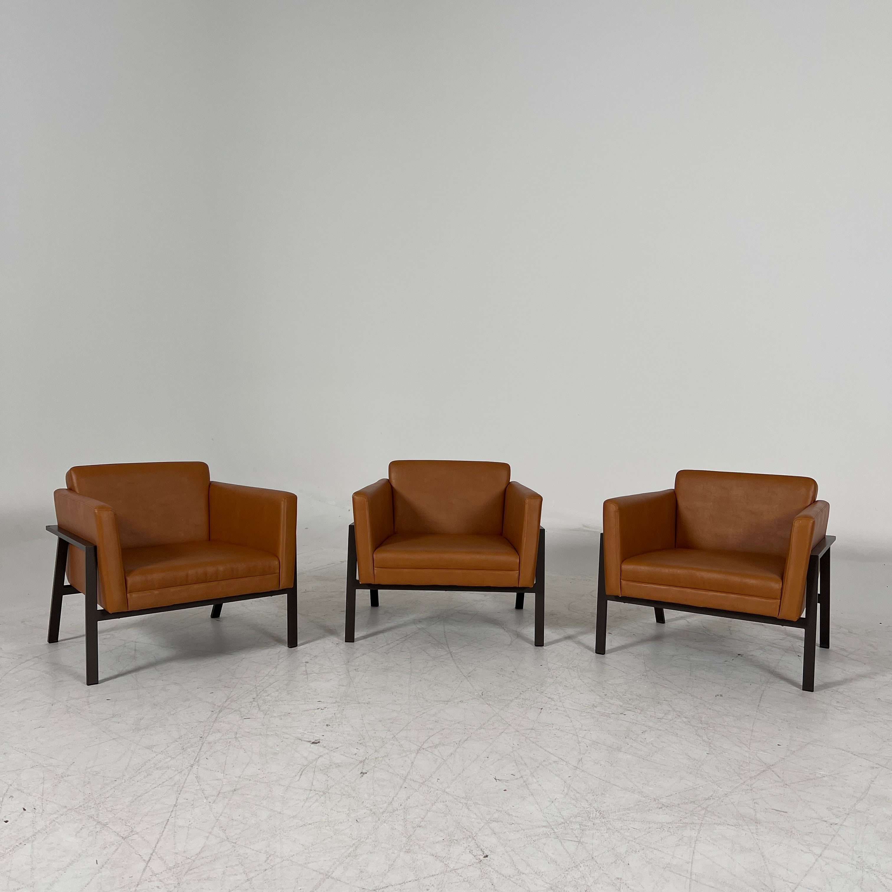 Cognac Armchairs. Faux leather and metal chairs. Delivery available