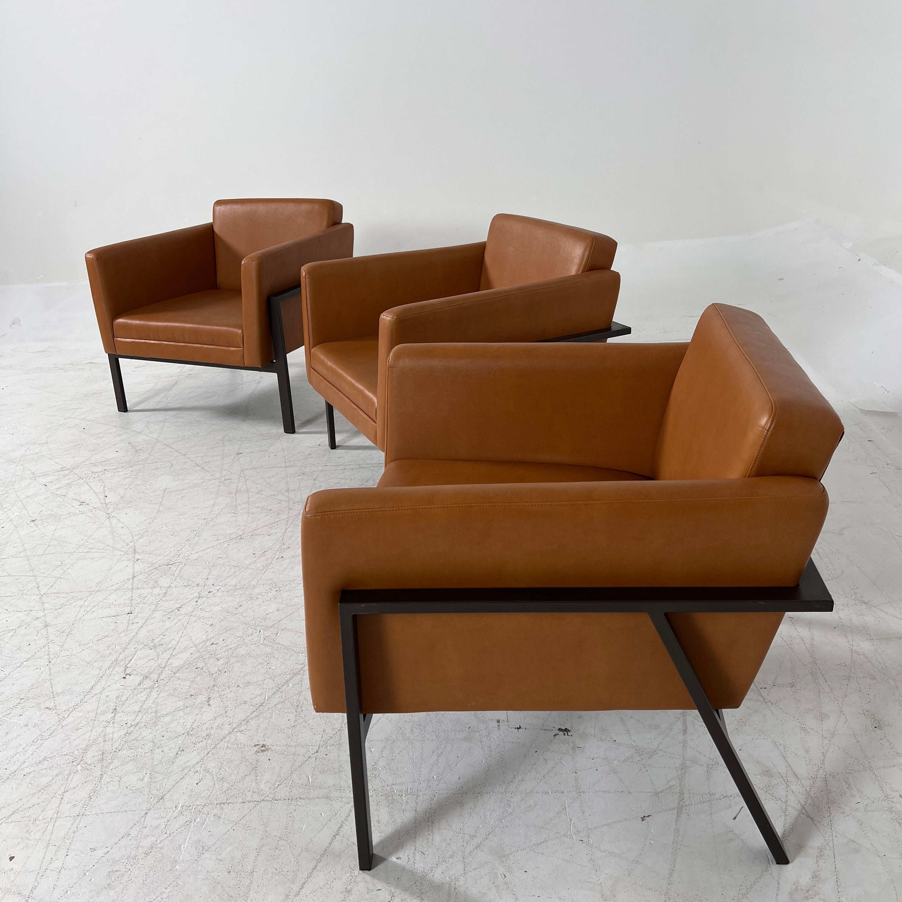 Cognac Armchairs. Faux leather and metal chairs. Delivery available