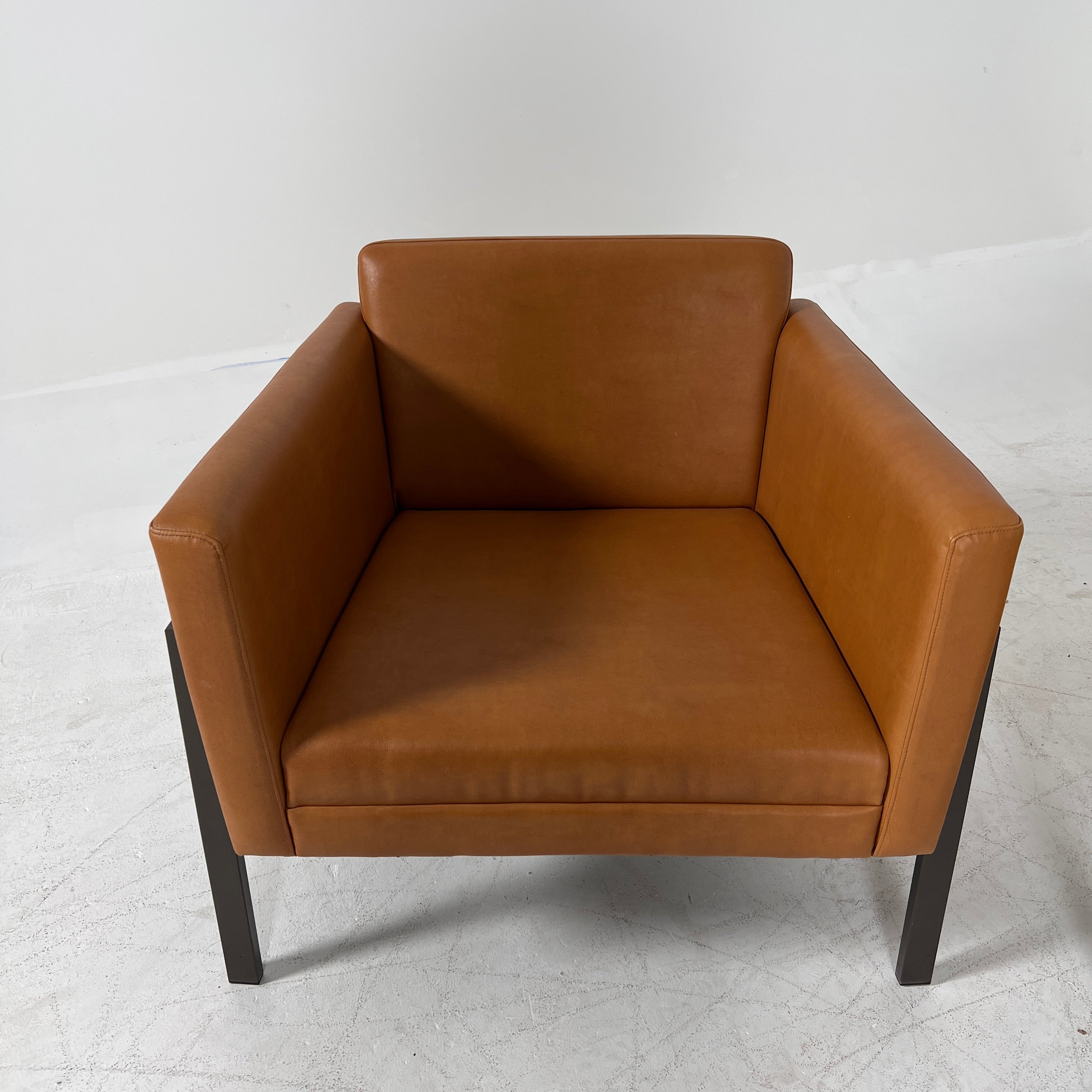 Cognac Armchairs. Faux leather and metal chairs. Delivery available