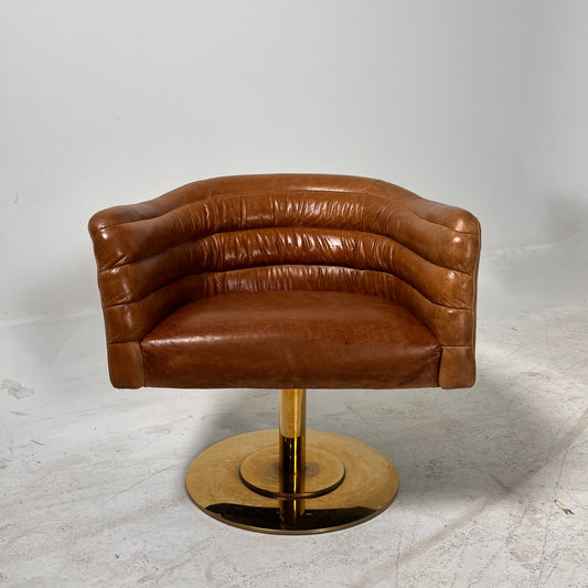CB2 swivel Armchair. Real Saddle Leather accent chair. Delivery available