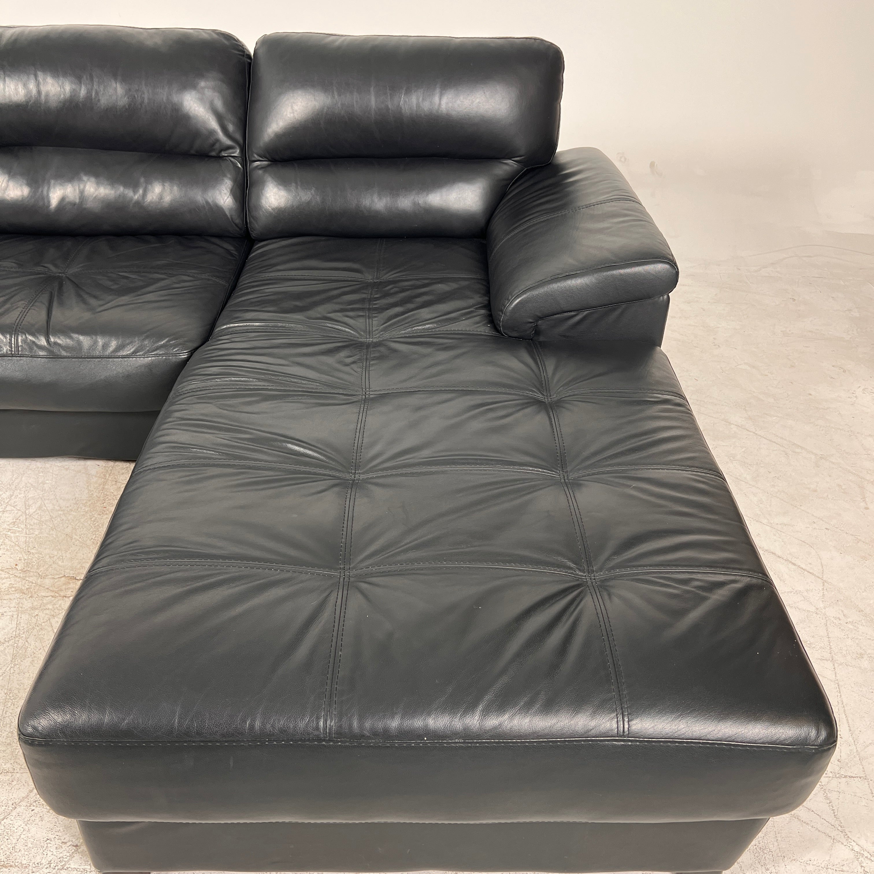 Black Leather Sectional. L shaped sofa couch. Delivery available