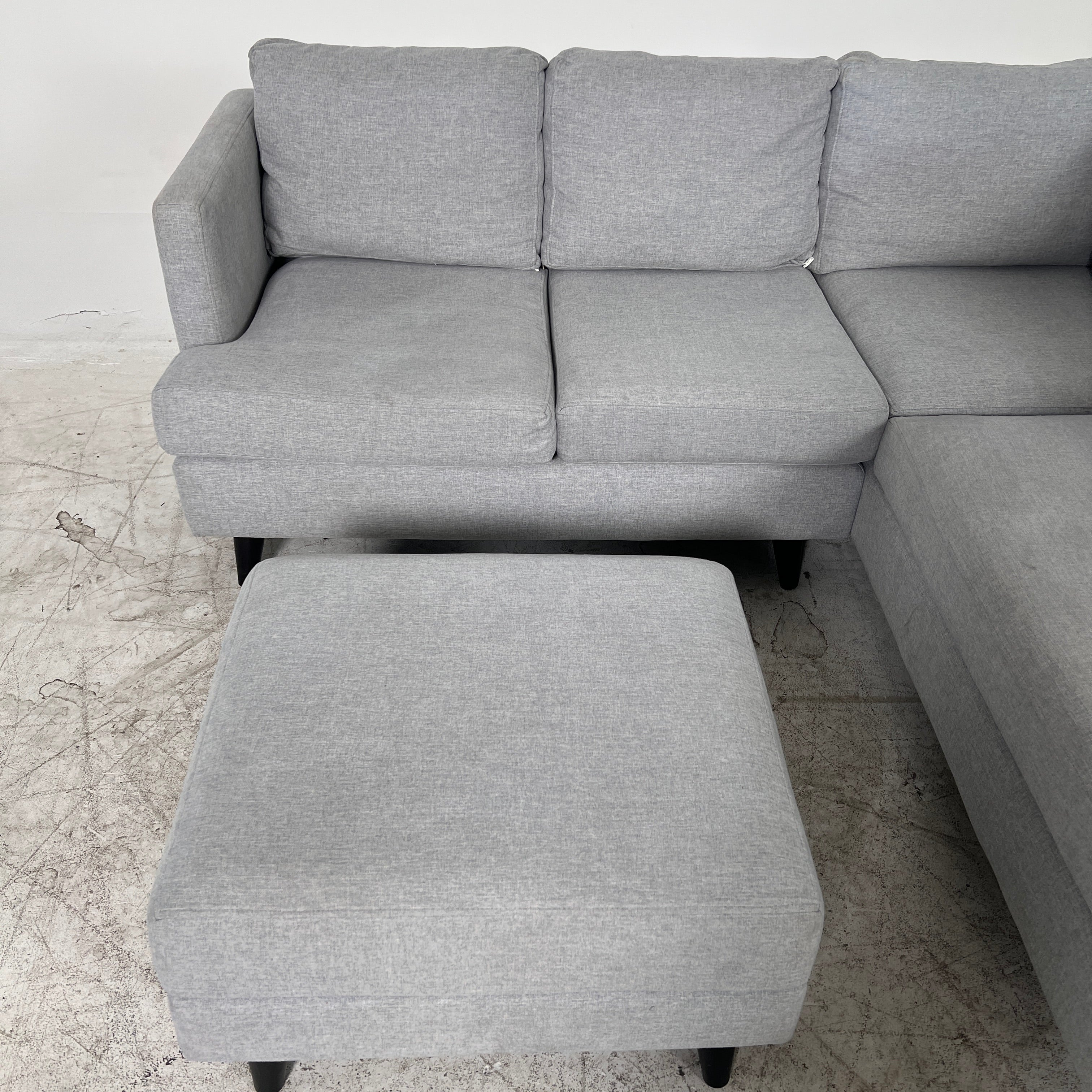 Stylus Sectional + ottoman. L shaped sofa couch. delivery available