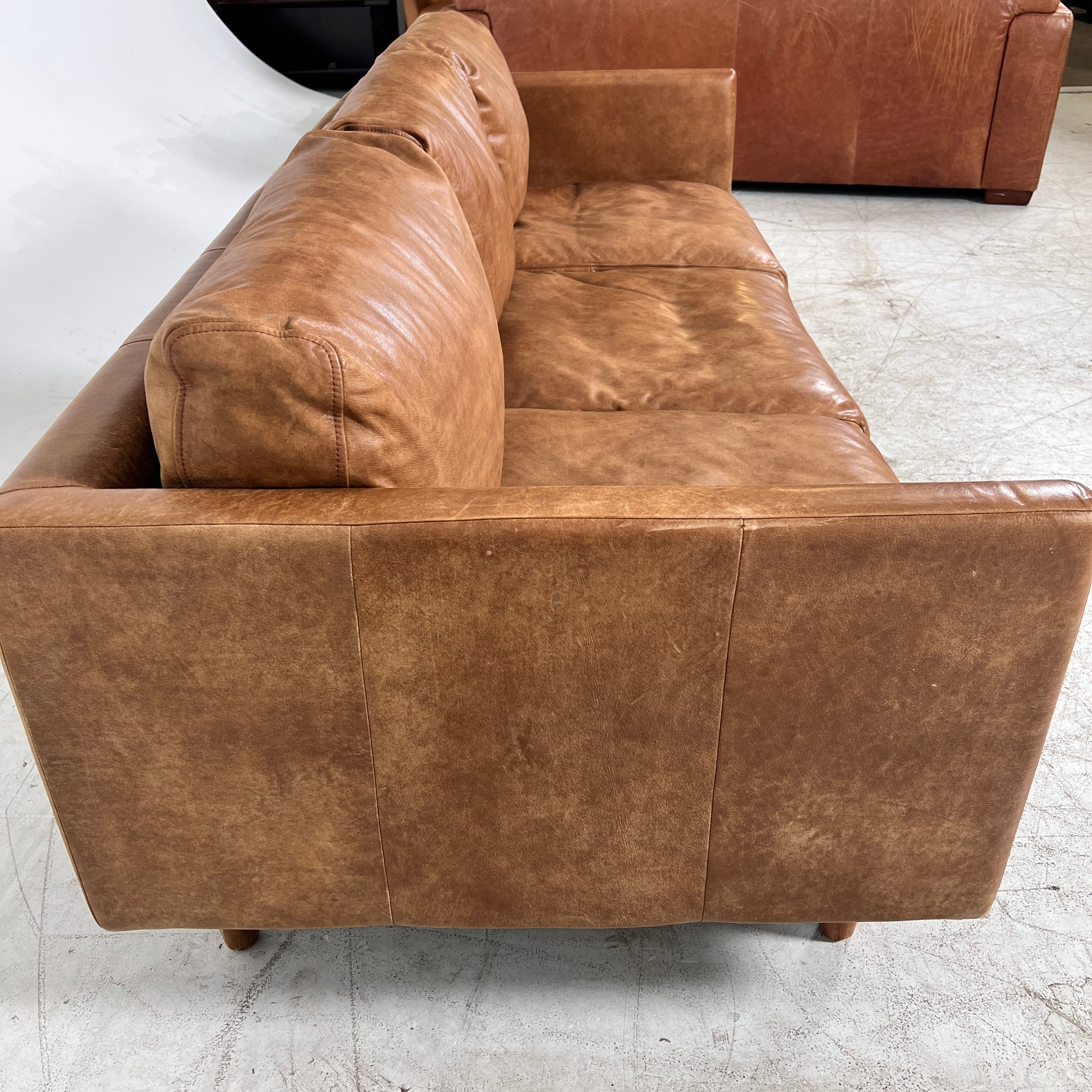 Article Nirvana Leather Sofa. 3 seater Distressed leather couch. Delivery available