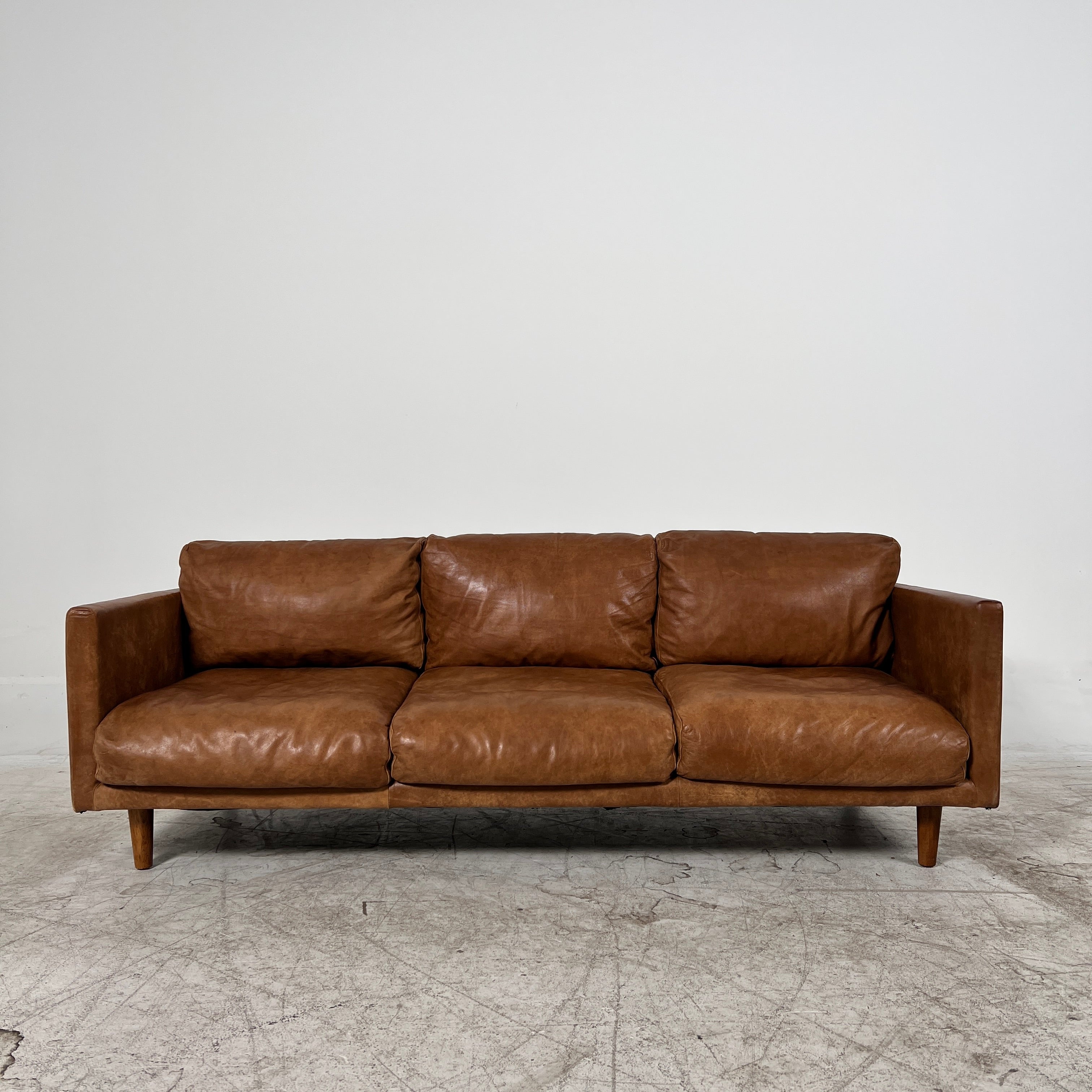 Article Nirvana Leather Sofa. 3 seater Distressed leather couch. Delivery available