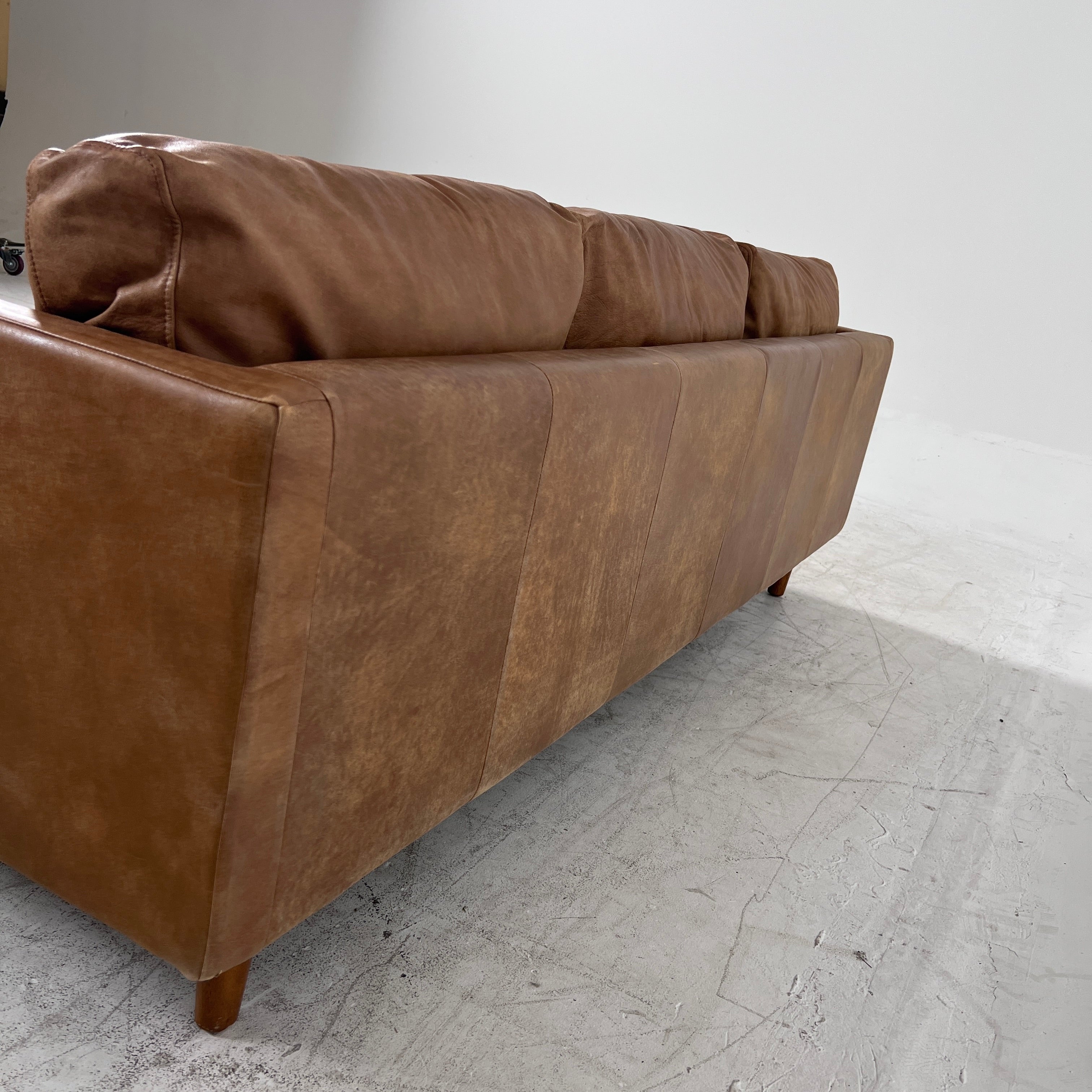 Article Nirvana Leather Sofa. 3 seater Distressed leather couch. Delivery available