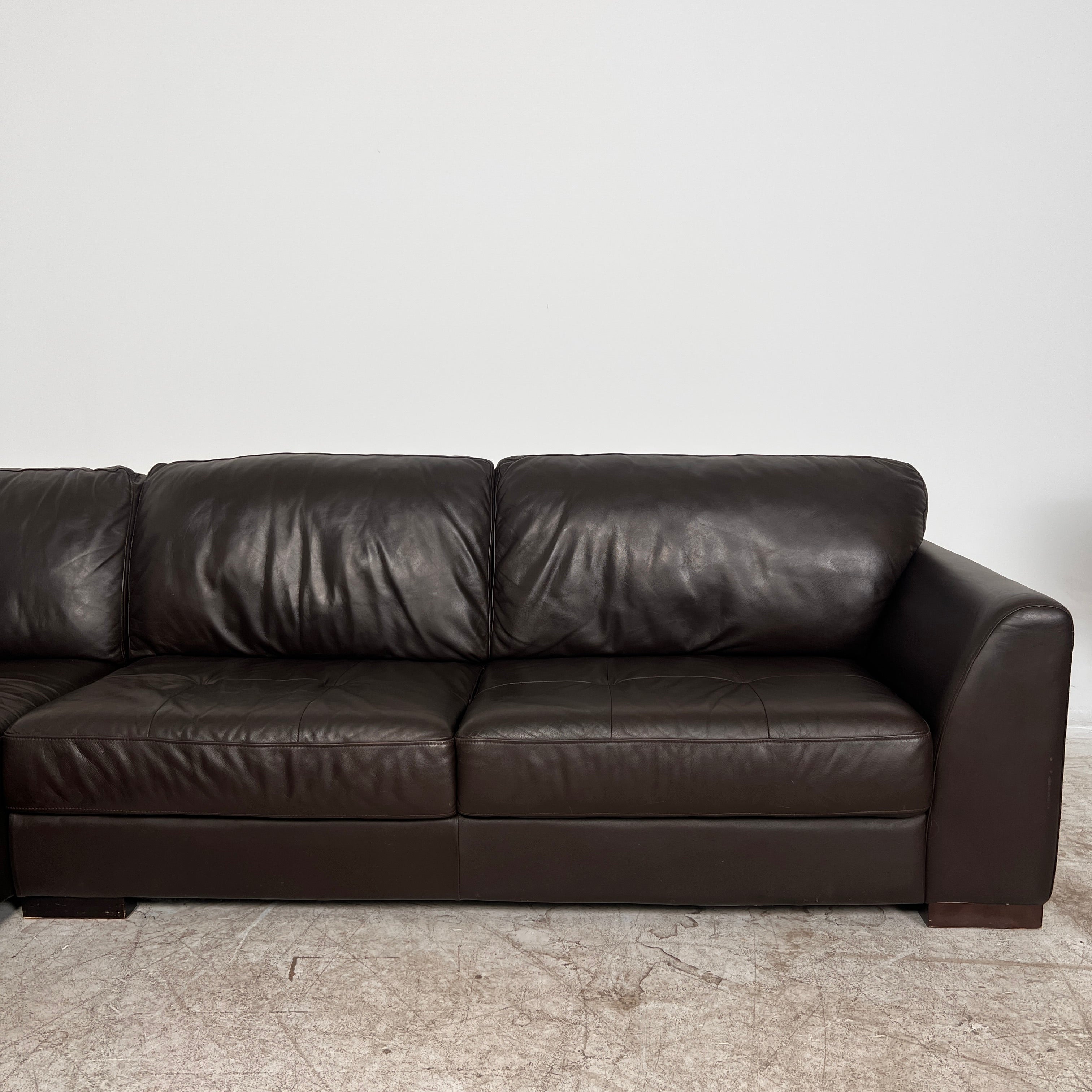 Urban Barn leather Sectional. Brown L shaped sofa couch. Delivery available