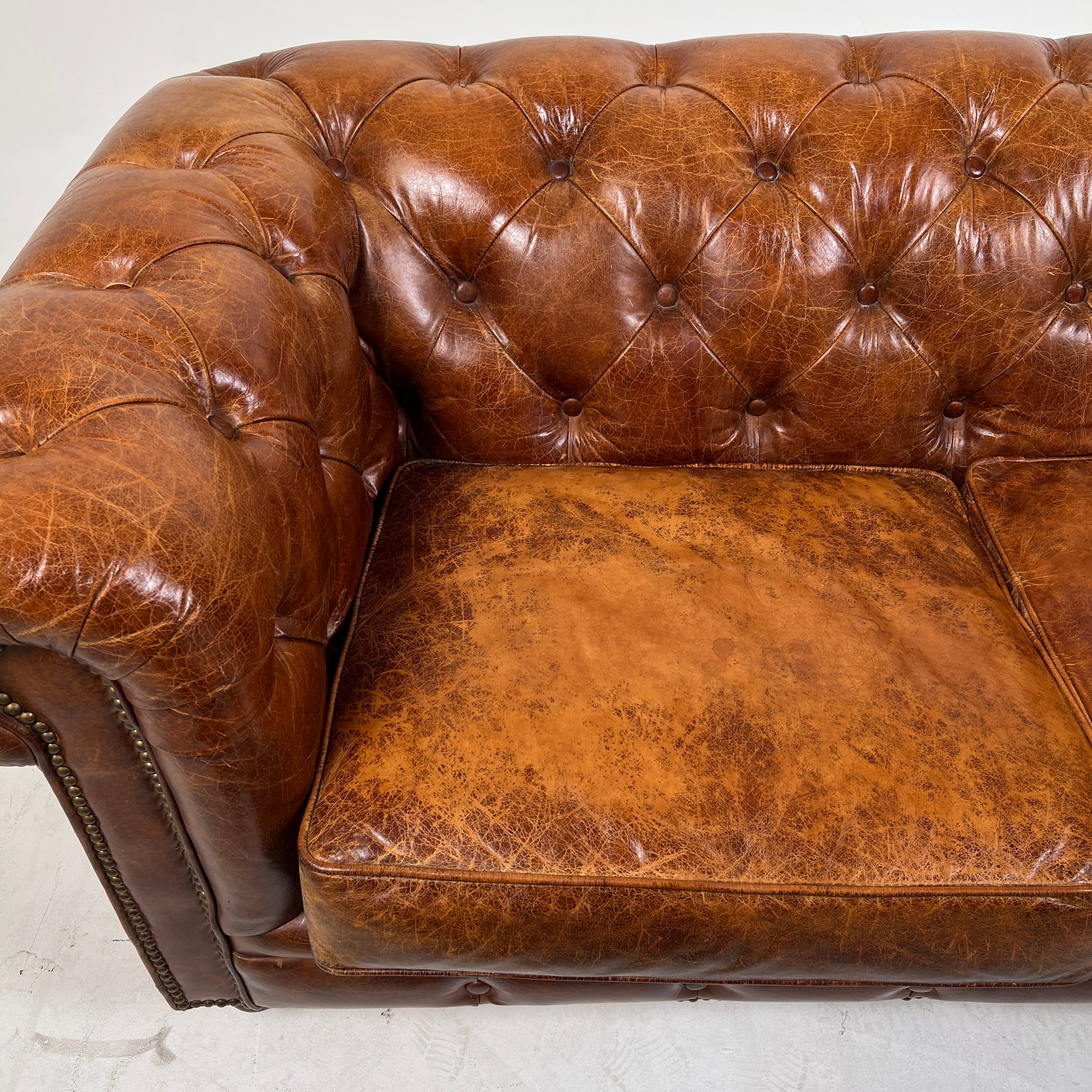 Moe's Chesterfield leather loveseat. Genuine Distressed leather sofa couch. Delivery available