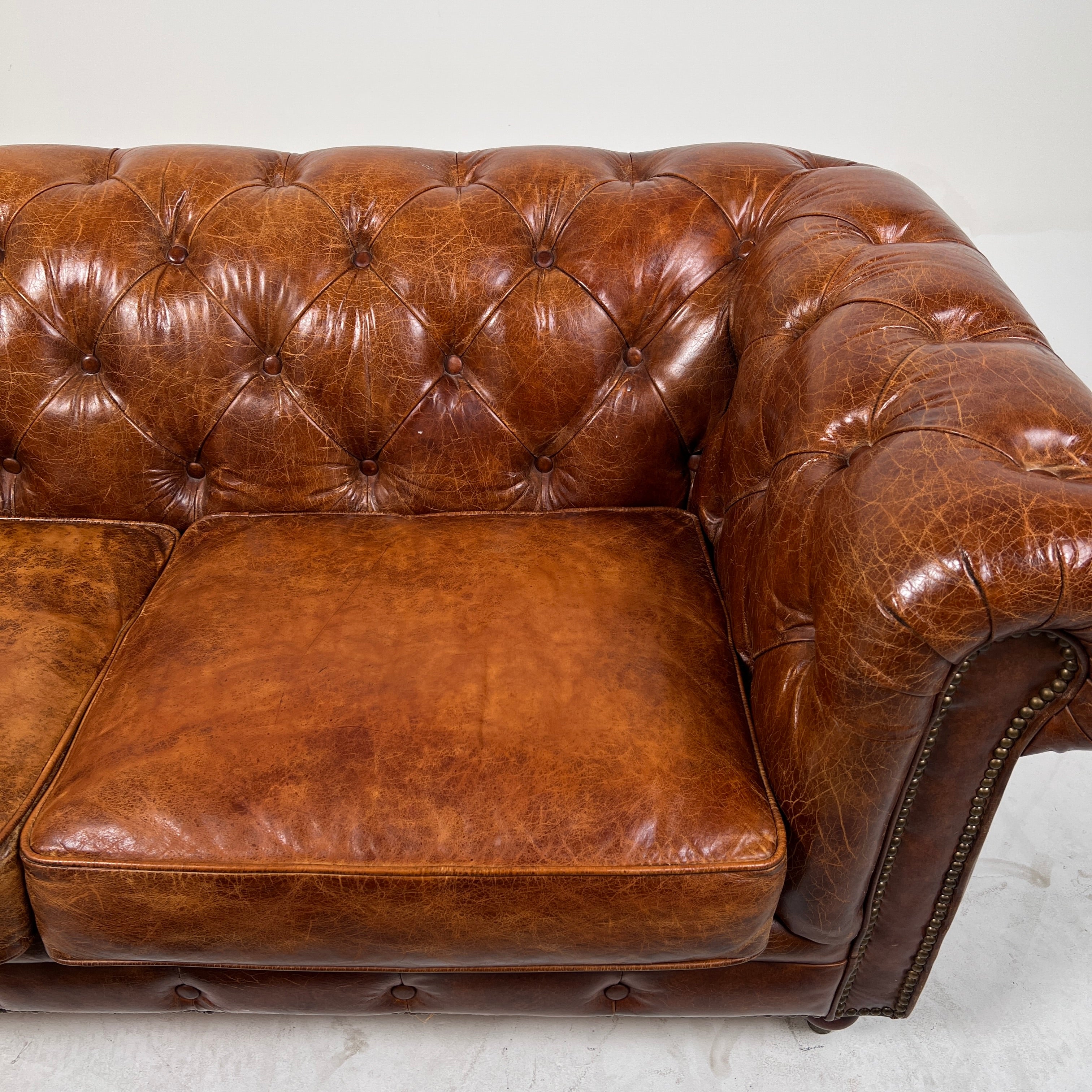 Moe's Chesterfield leather loveseat. Genuine Distressed leather sofa couch. Delivery available