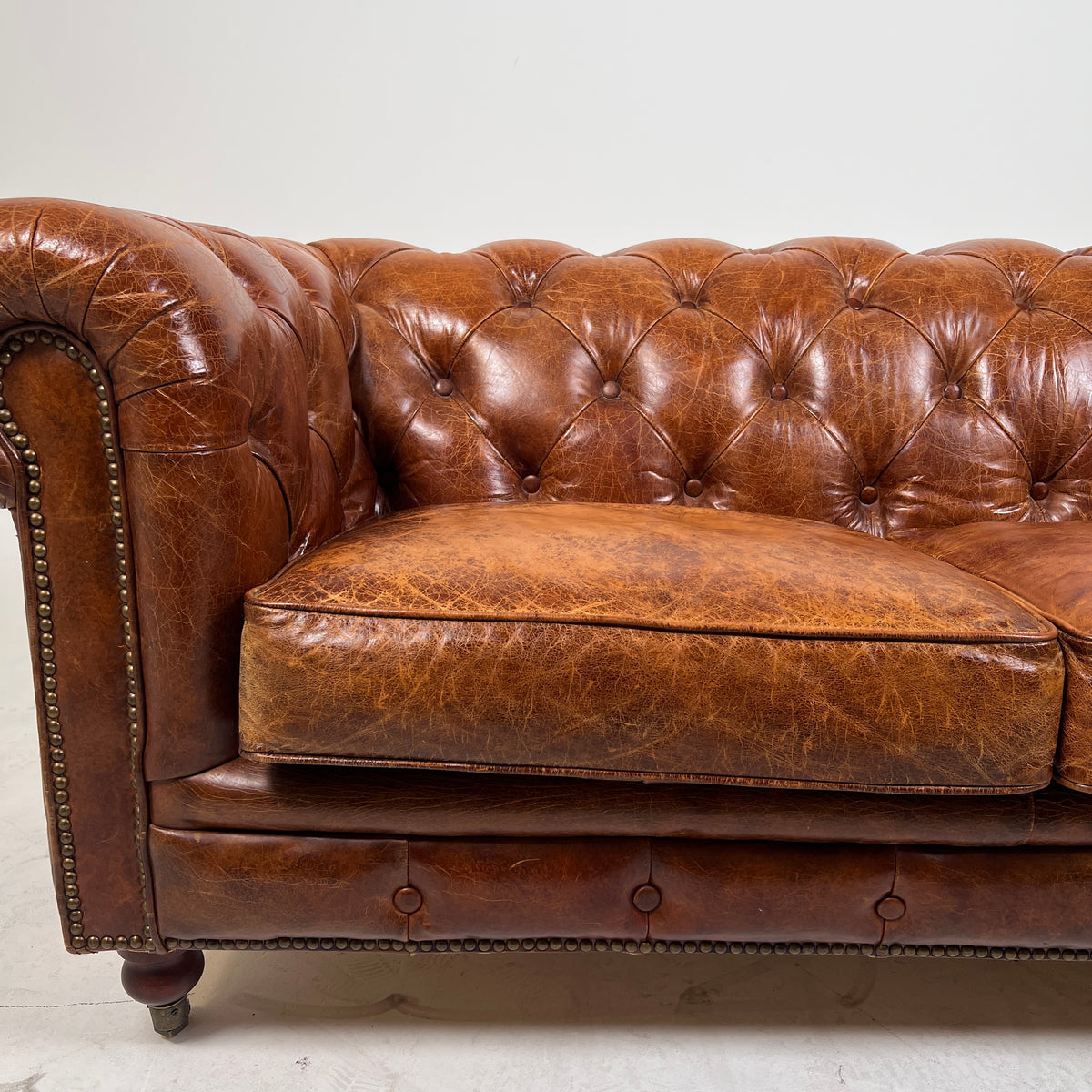 Moe's Chesterfield leather loveseat. Genuine Distressed leather sofa couch. Delivery available