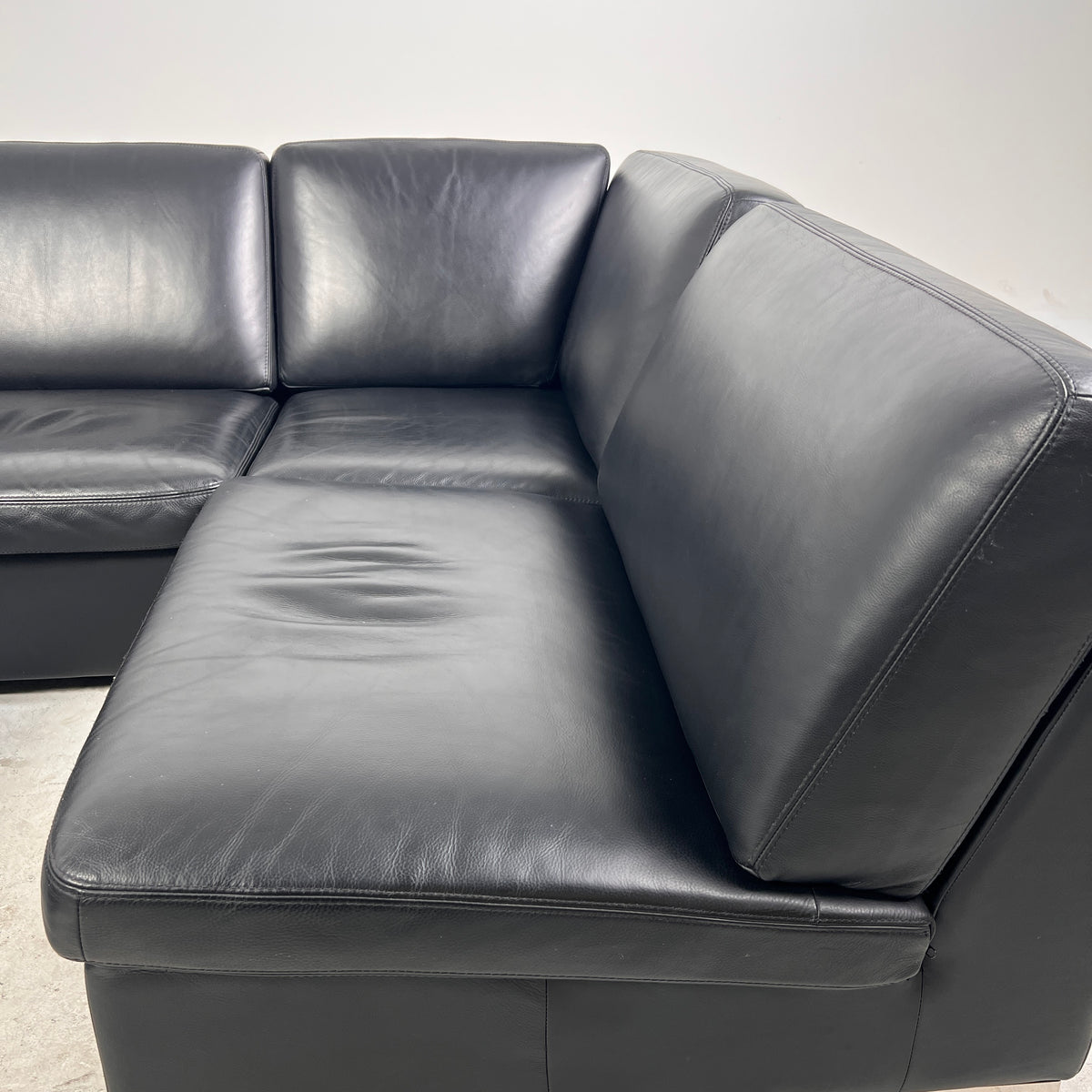 Down Filled Leather Sectional. L shaped sofa couch. Delivery available