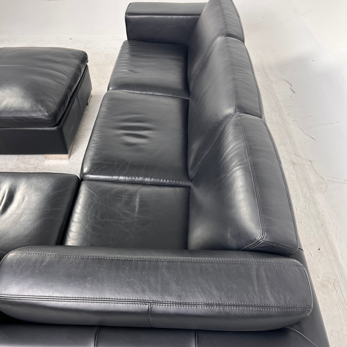 Down Filled Leather Sectional. L shaped sofa couch. Delivery available