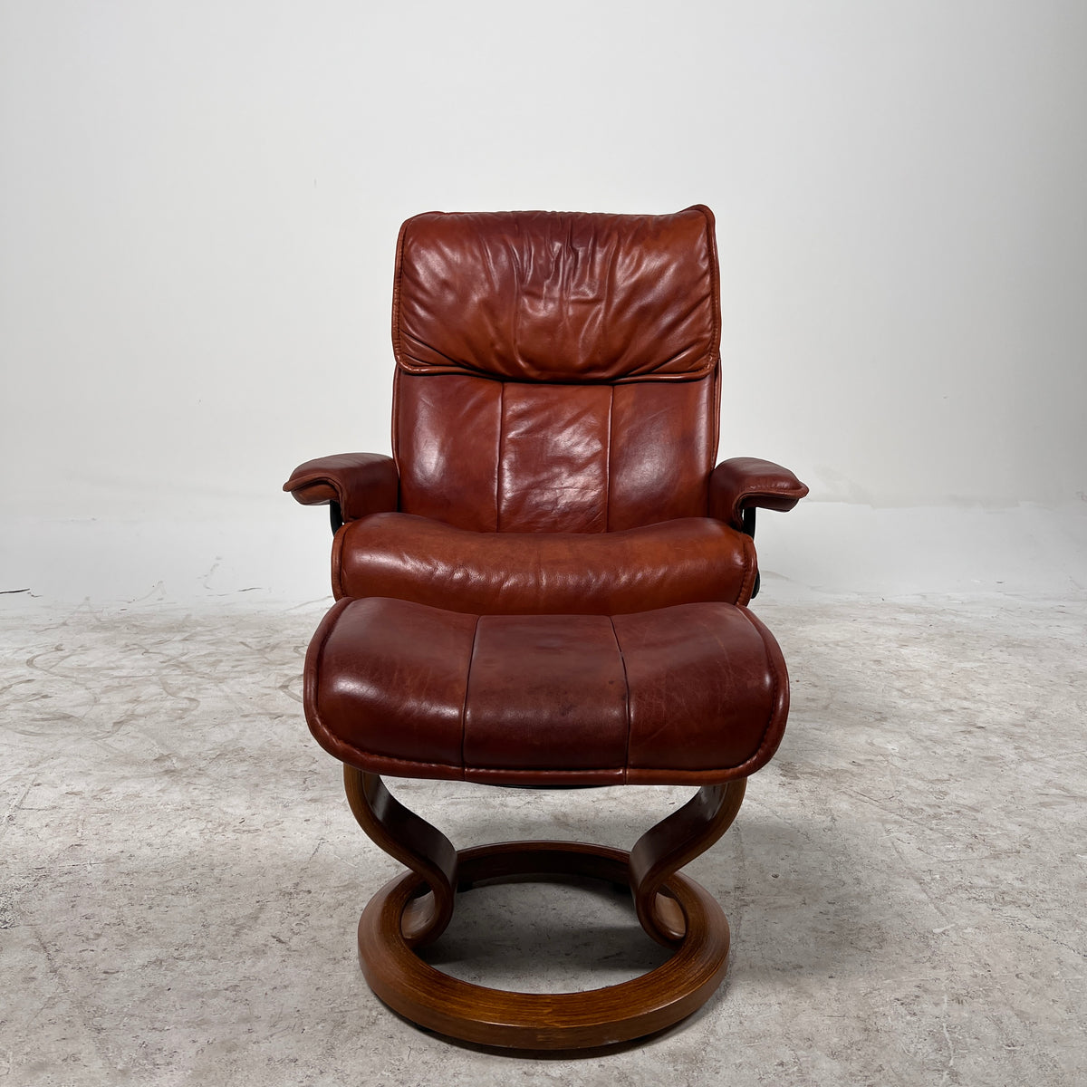 Ekornes Stressless Leather chair + ottoman. Cognac Brown recliner chair.