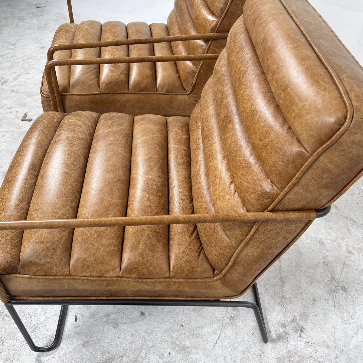 Urban Barn Distressed leather Armchair. Matching Chairs.