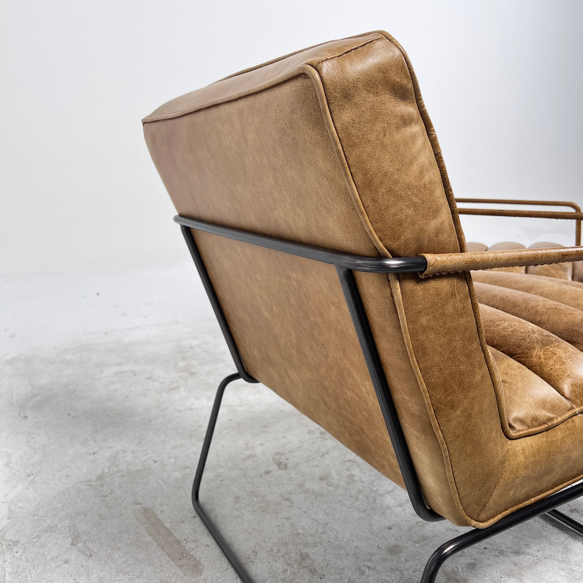 Urban Barn Distressed leather Armchair. Matching Chairs.