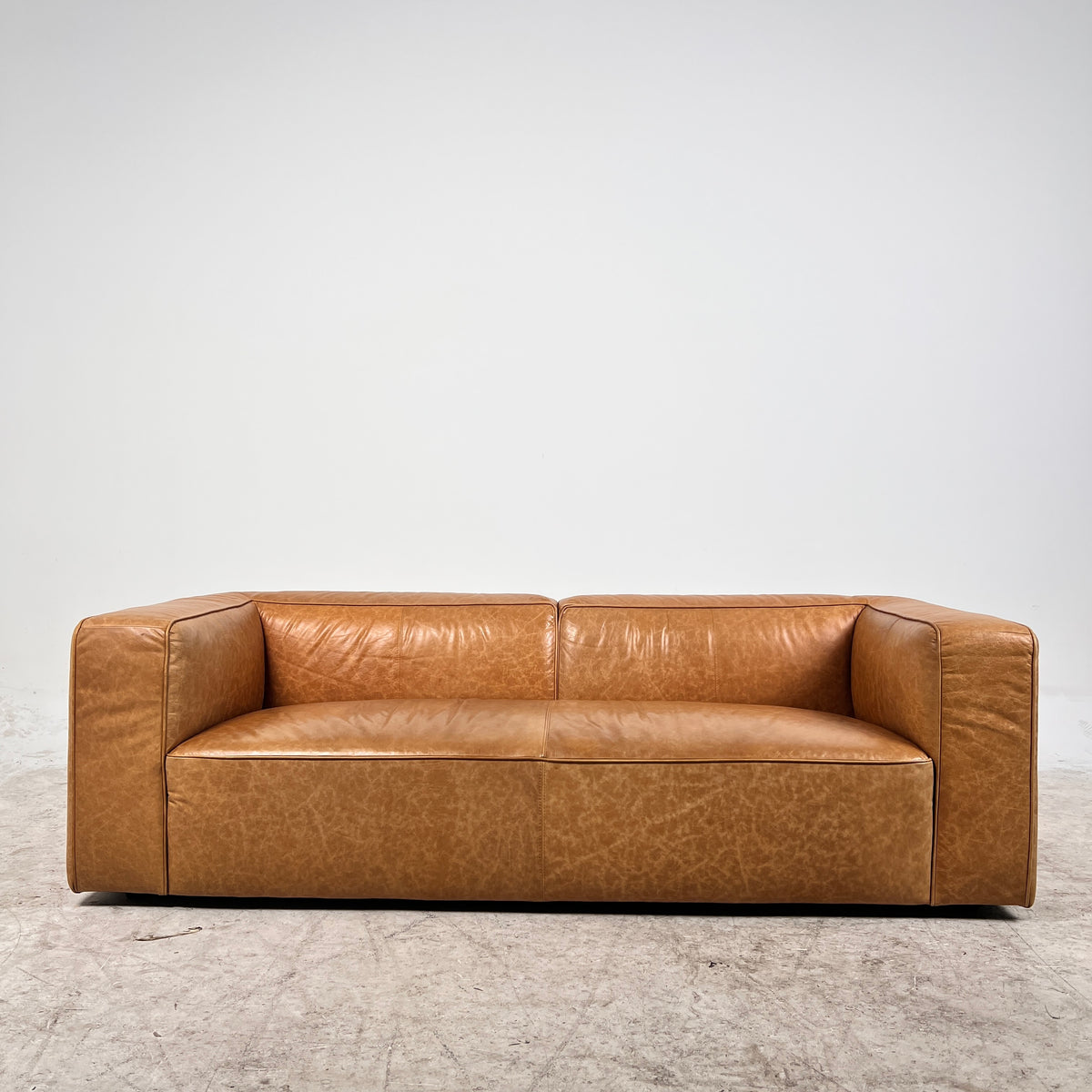 CB2 Lenyx Cognac leather Sofa. Cigar Leather Sofa couch. Delivery available