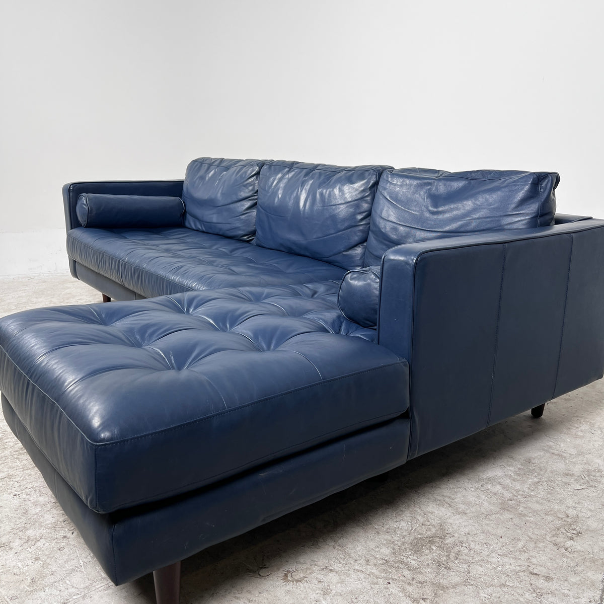 Article Sven Leather Sectional. Blue L shaped sofa couch. Delivery available