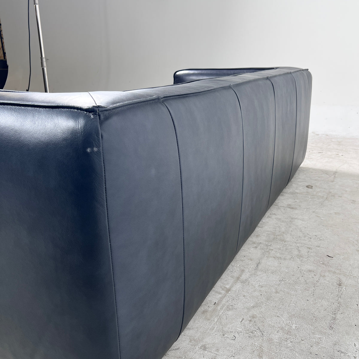 Moe's Cigar Couch. Navy blue leather Sofa couch. Delivery available