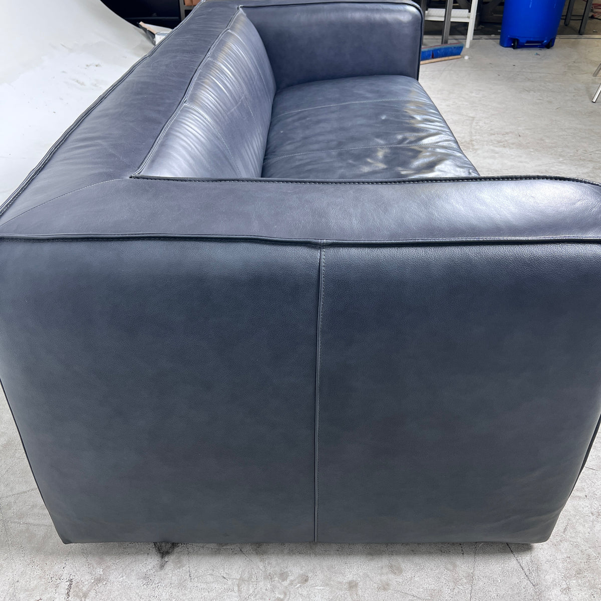 Moe's Cigar Couch. Navy blue leather Sofa couch. Delivery available