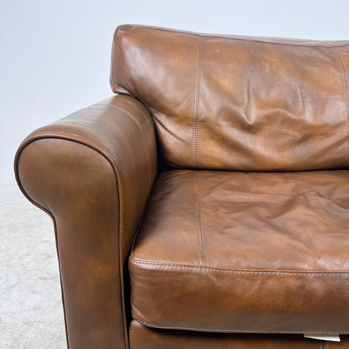 Genuine Leather Armchair. Rolled arms cigar style chair. delivery available