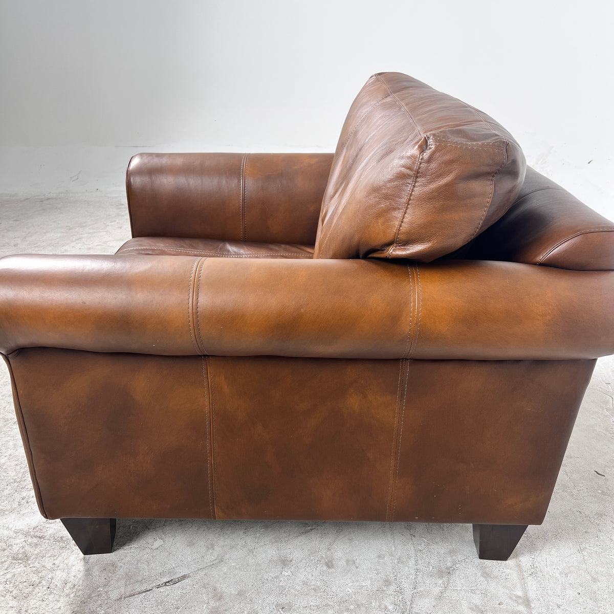 Genuine Leather Armchair. Rolled arms cigar style chair. delivery available