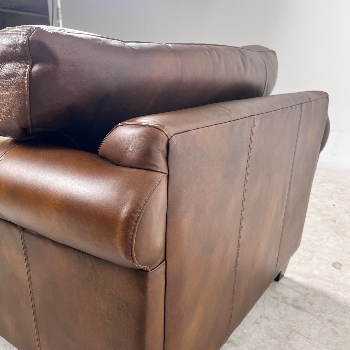 Genuine Leather Armchair. Rolled arms cigar style chair. delivery available