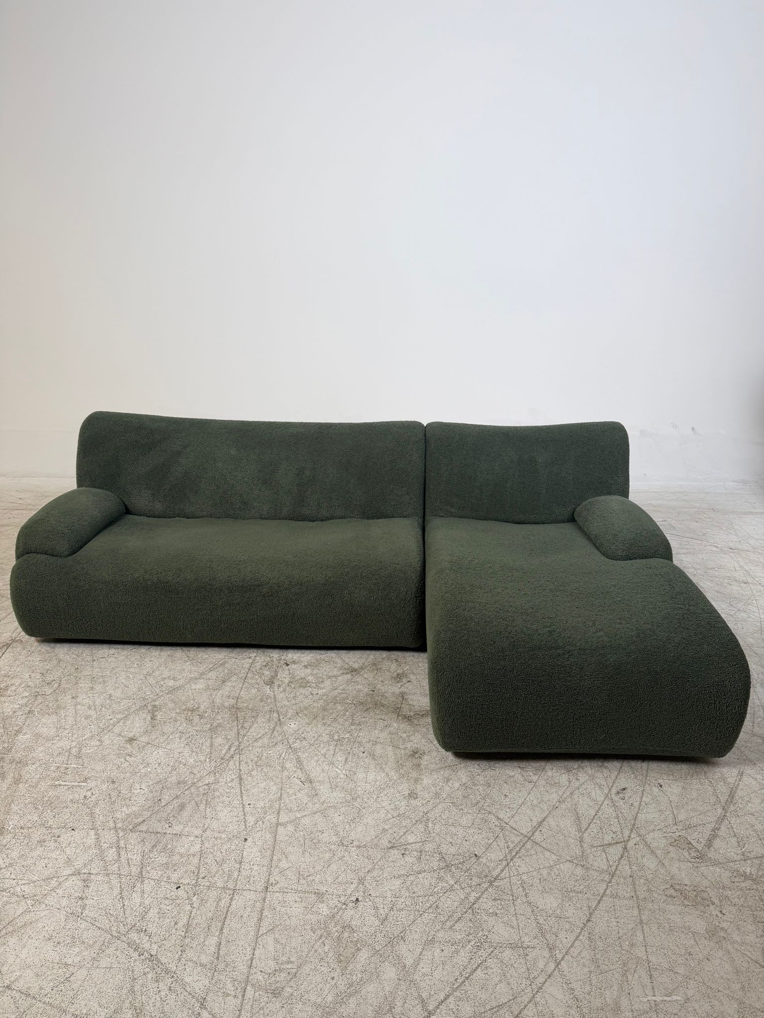 Kings living Green Booucle sectional. Reversible L shaped sofa couch. Delivery available