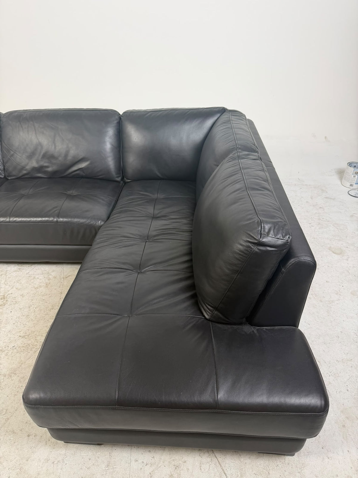 Urban Barn Leather Sectional. Black L shaped sofa couch. Delivery available
