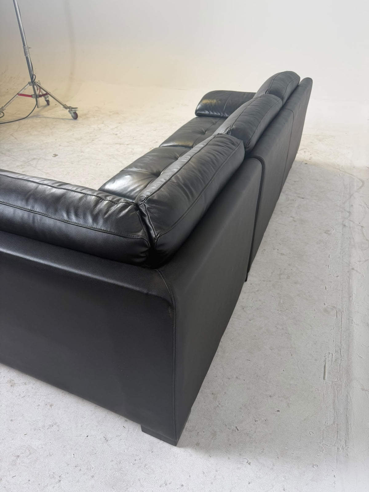 Urban Barn Leather Sectional. Black L shaped sofa couch. Delivery available