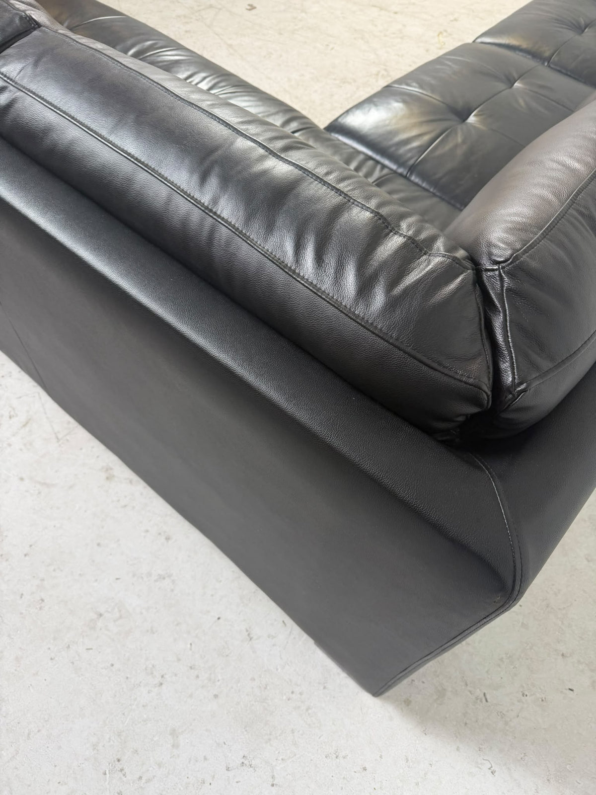 Urban Barn Leather Sectional. Black L shaped sofa couch. Delivery available
