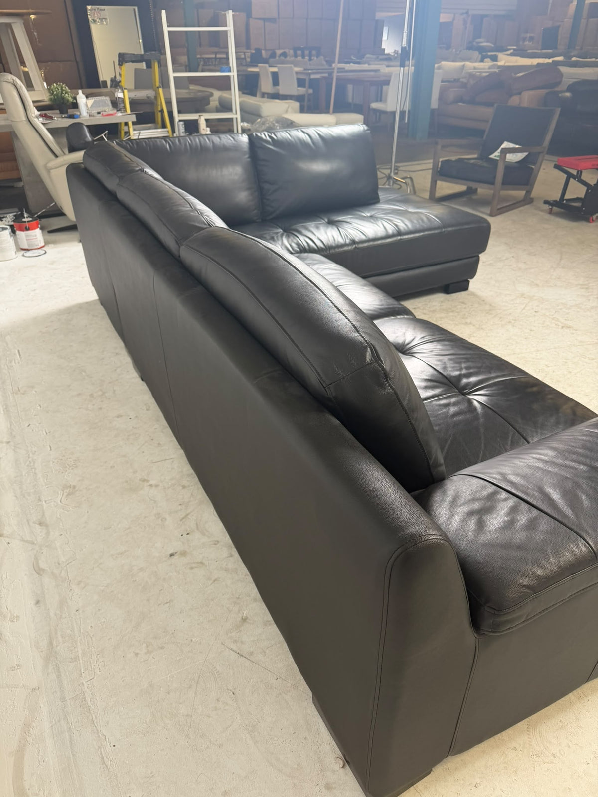 Urban Barn Leather Sectional. Black L shaped sofa couch. Delivery available