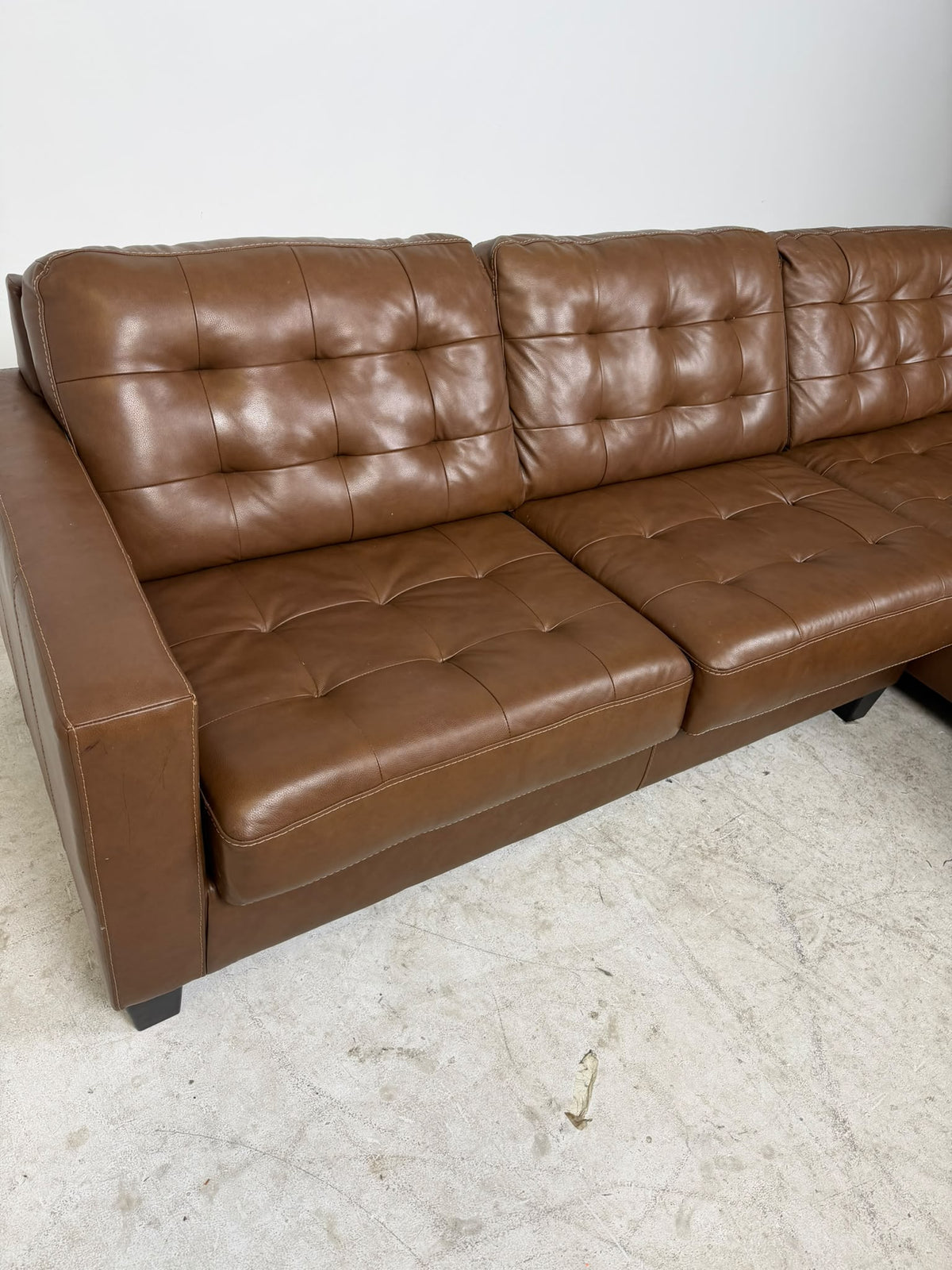 Ashley's Furniture Leather Sectional. Cognac L shaped sofa couch. Delivery available