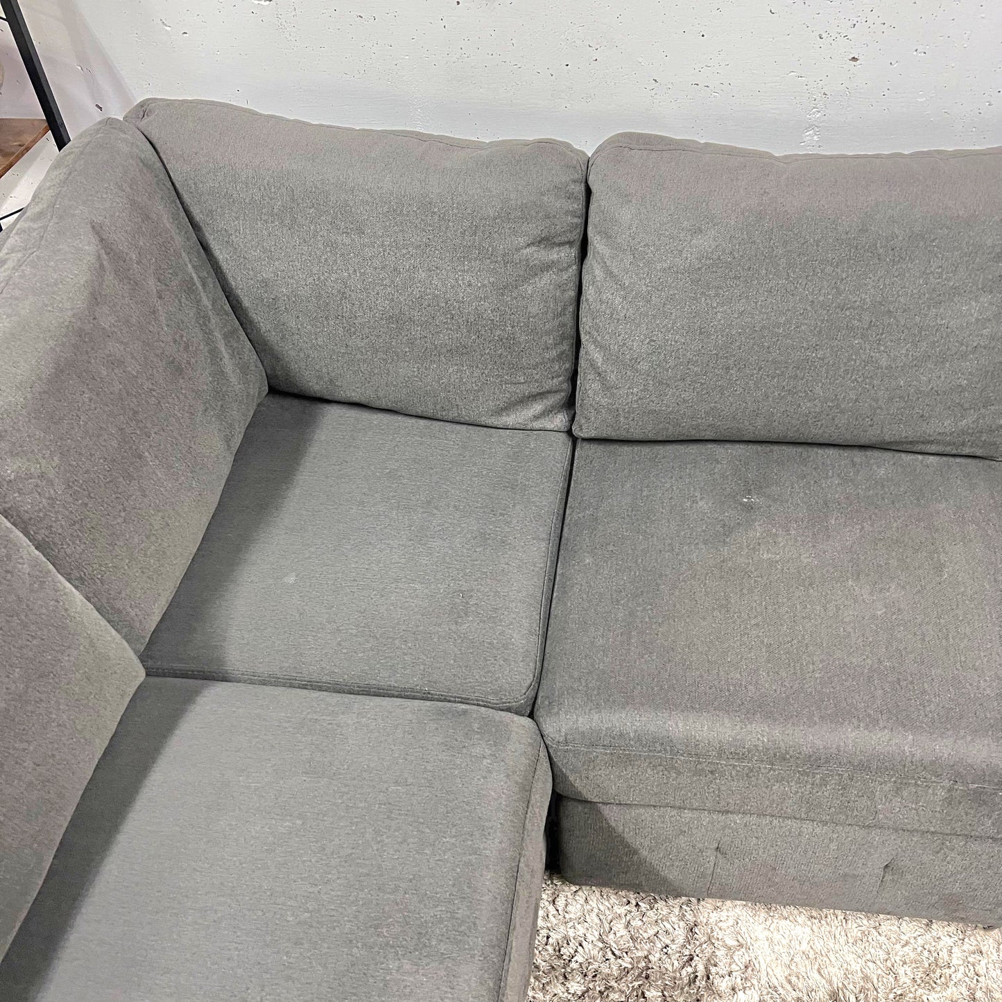U shaped pull out sectional. Storage sofa couch