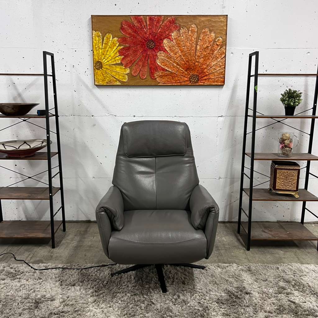 Power leather reclining chair. Real leather armchair.