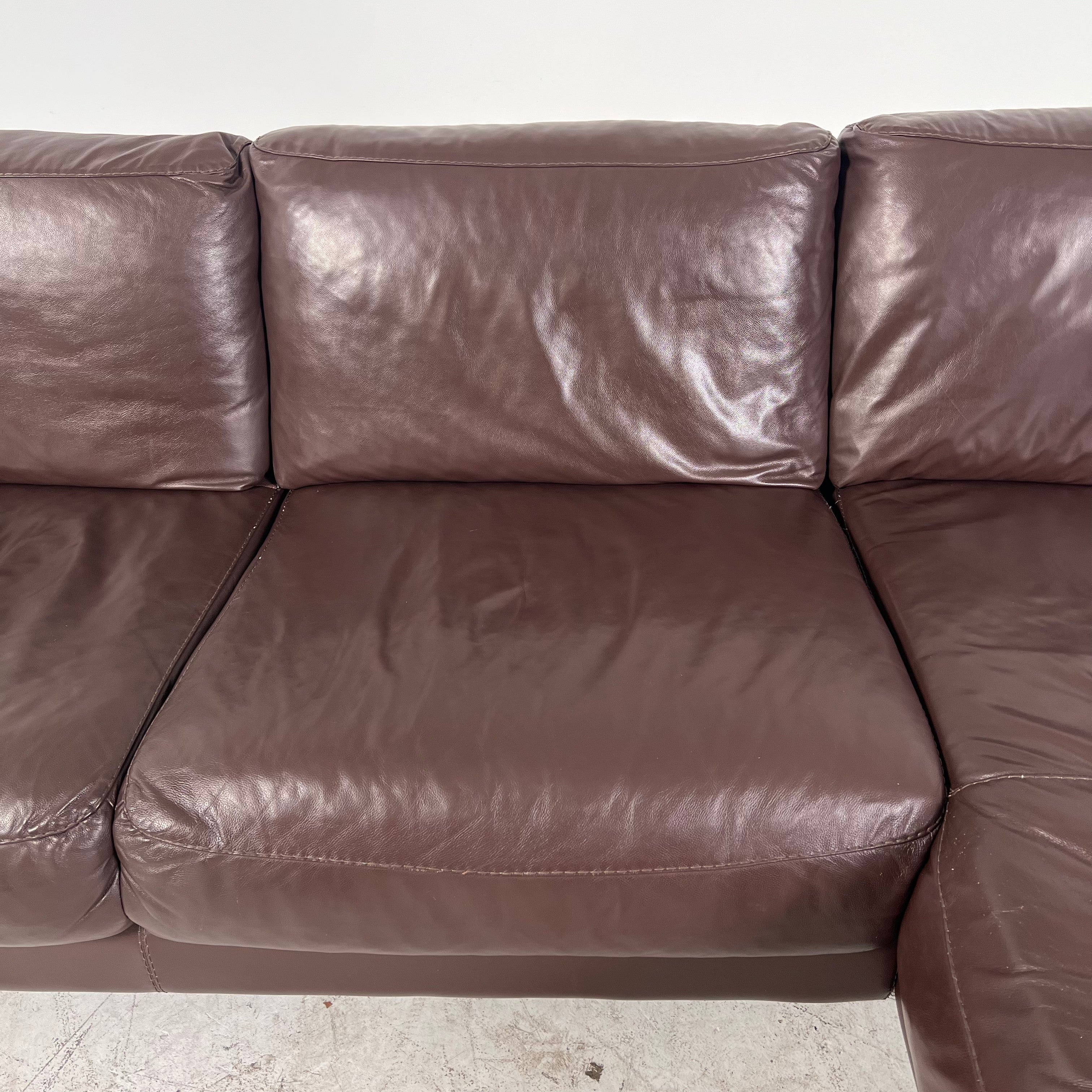 Genuine high end brown leather sectional. L Shaped sofa couch