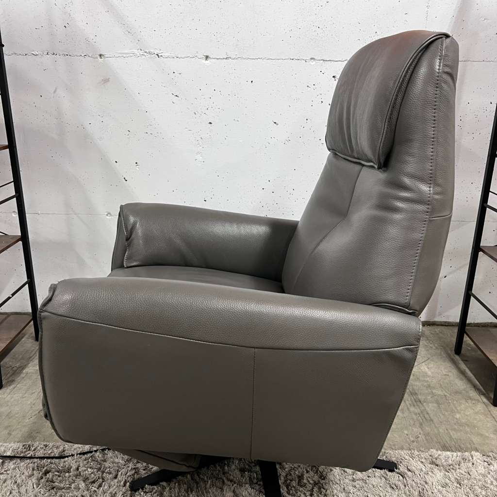 Power leather reclining chair. Real leather armchair.