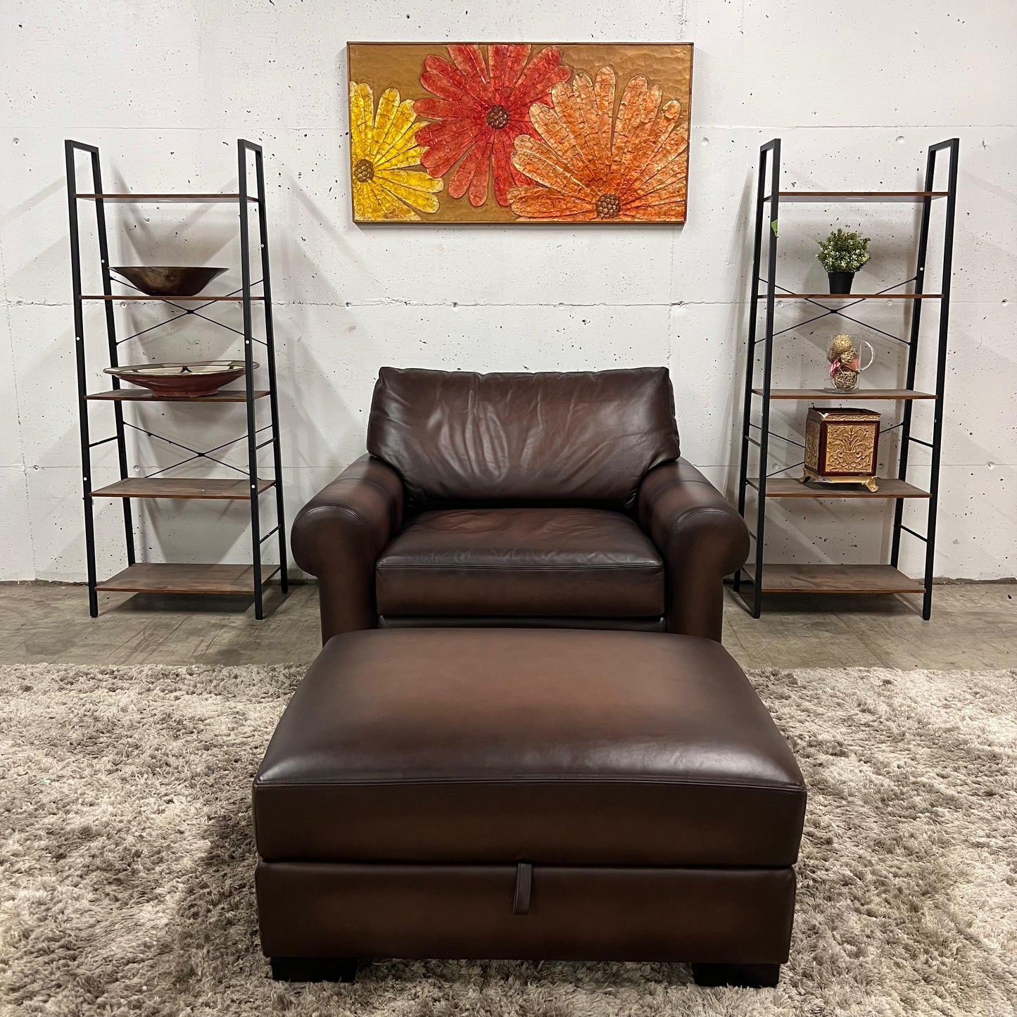 Pottery barn leather chair and a half.