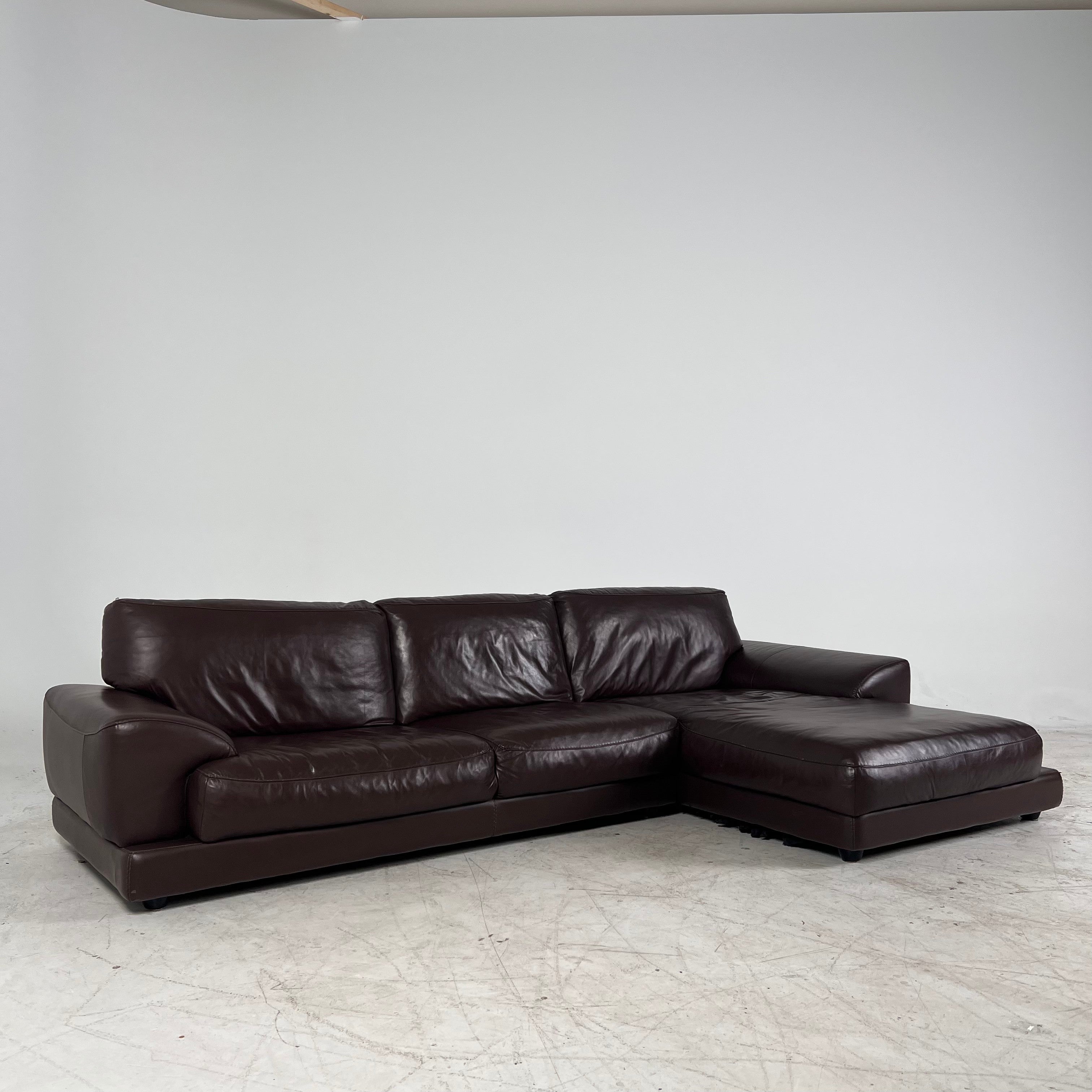 Genuine high end brown leather sectional. L Shaped sofa couch