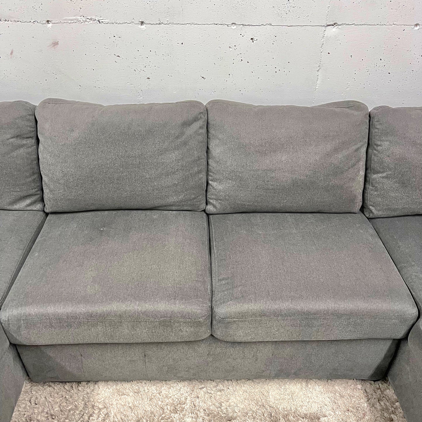 U shaped pull out sectional. Storage sofa couch