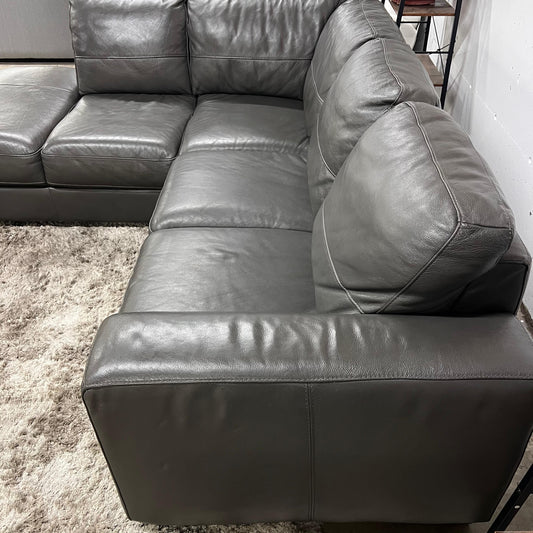 Grey leather sectional. L shaped sofa couch.