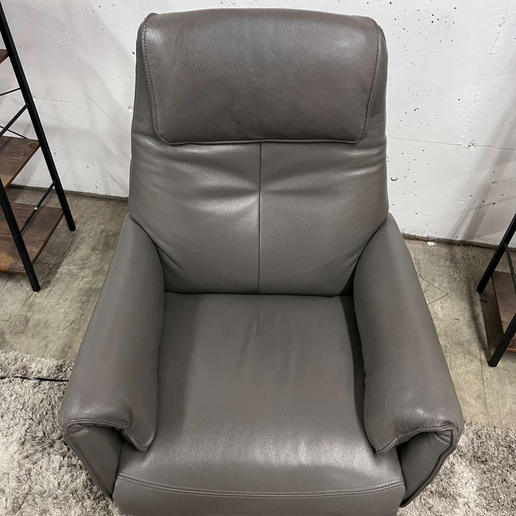 Power leather reclining chair. Real leather armchair.