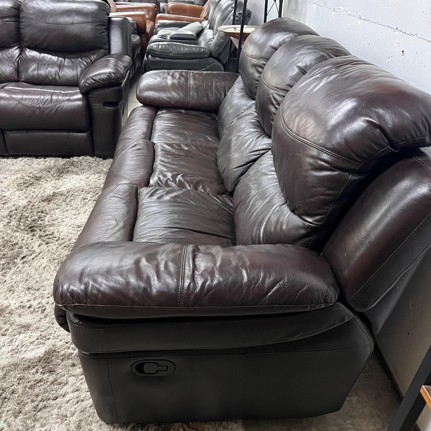 Real leather Reclining sofa set.
