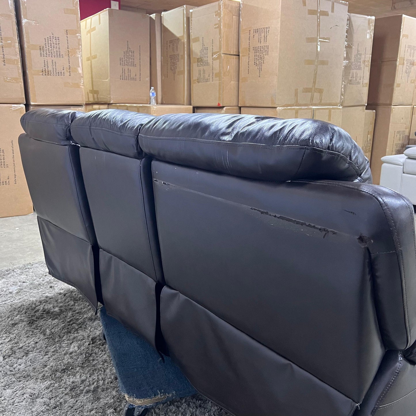 Real leather Reclining sofa set.