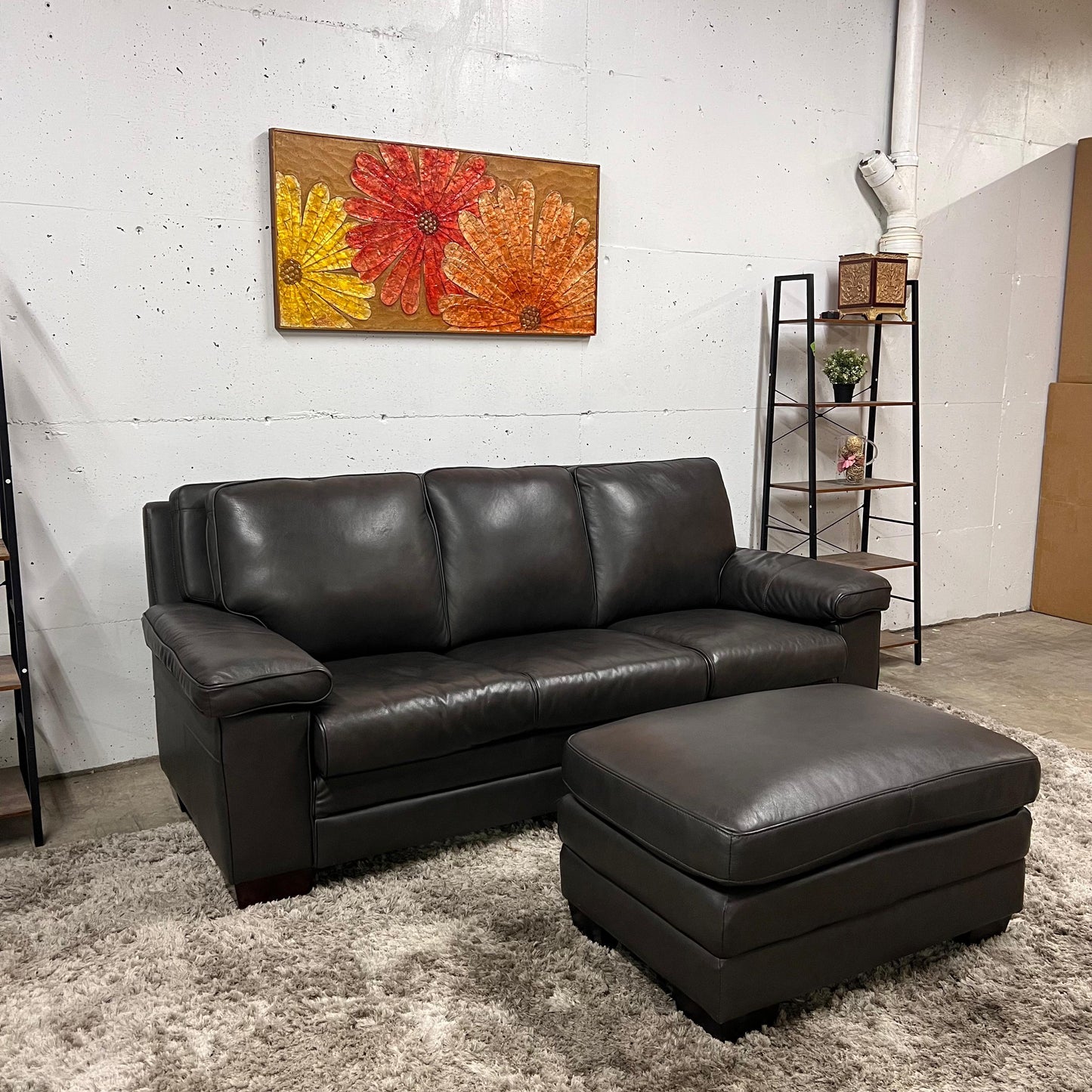 Amax leather sofa and matching ottoman