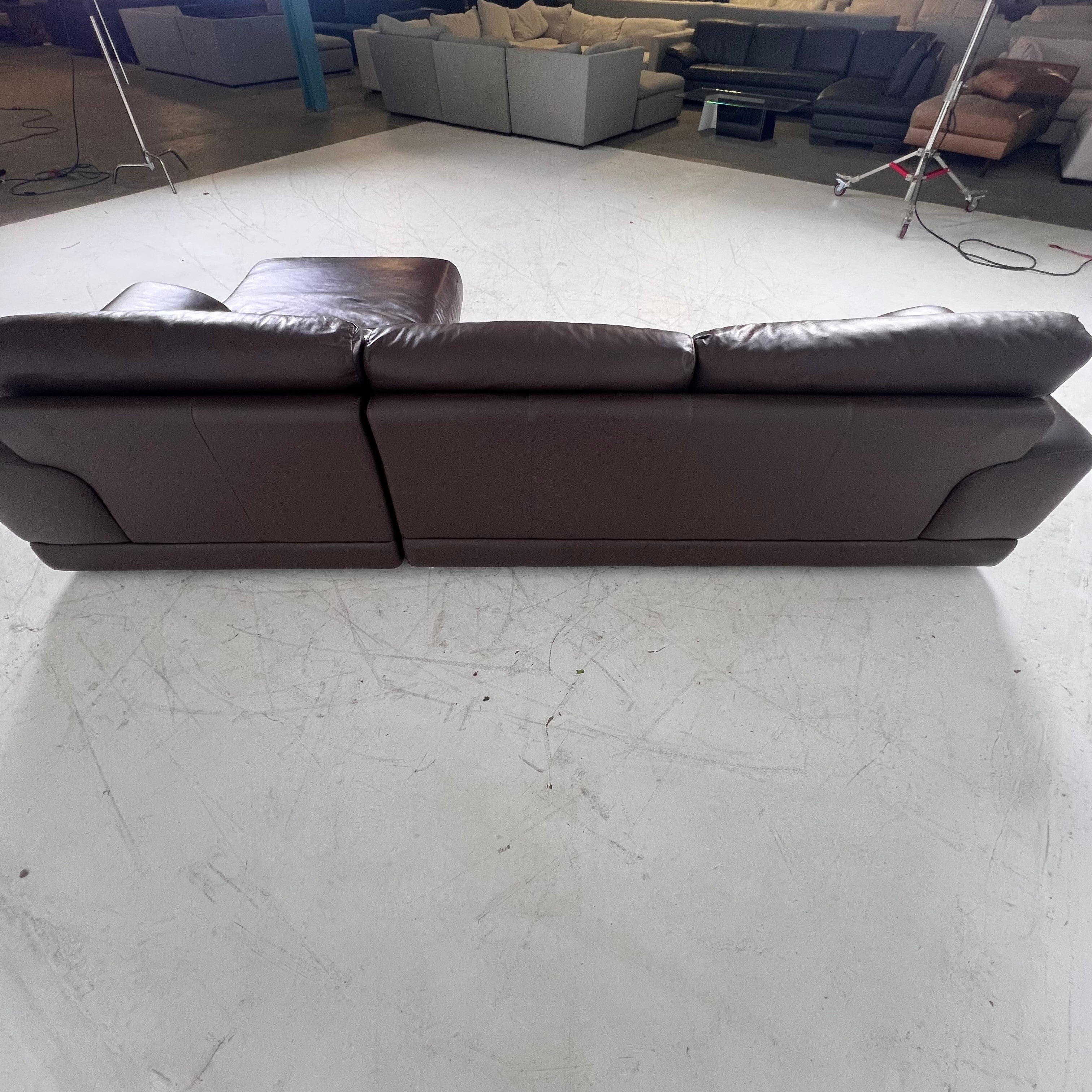 Genuine high end brown leather sectional. L Shaped sofa couch
