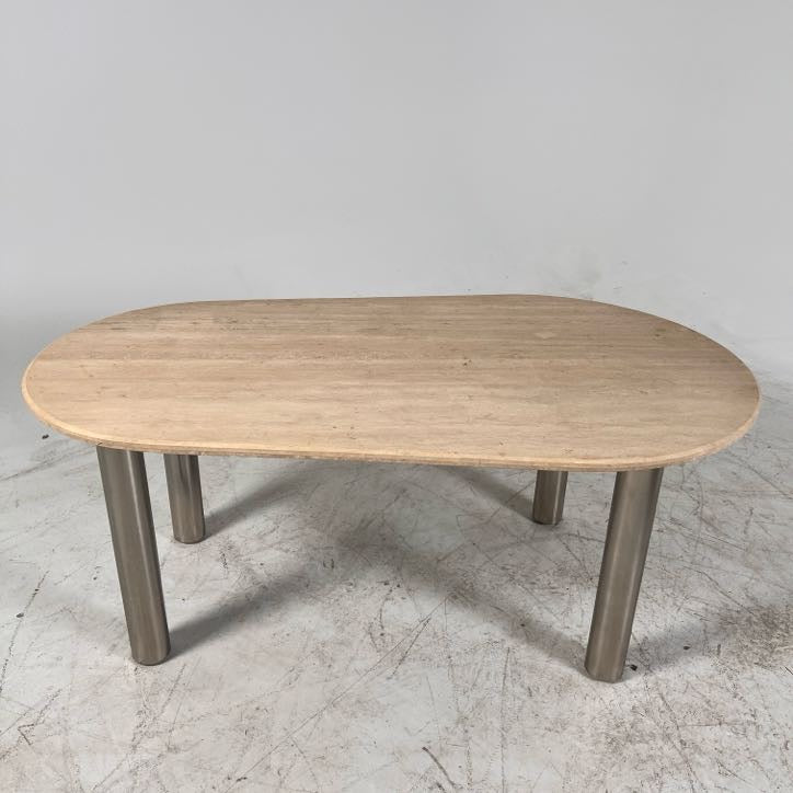 New Moe's fia dining table. travertine. Retails for $3199