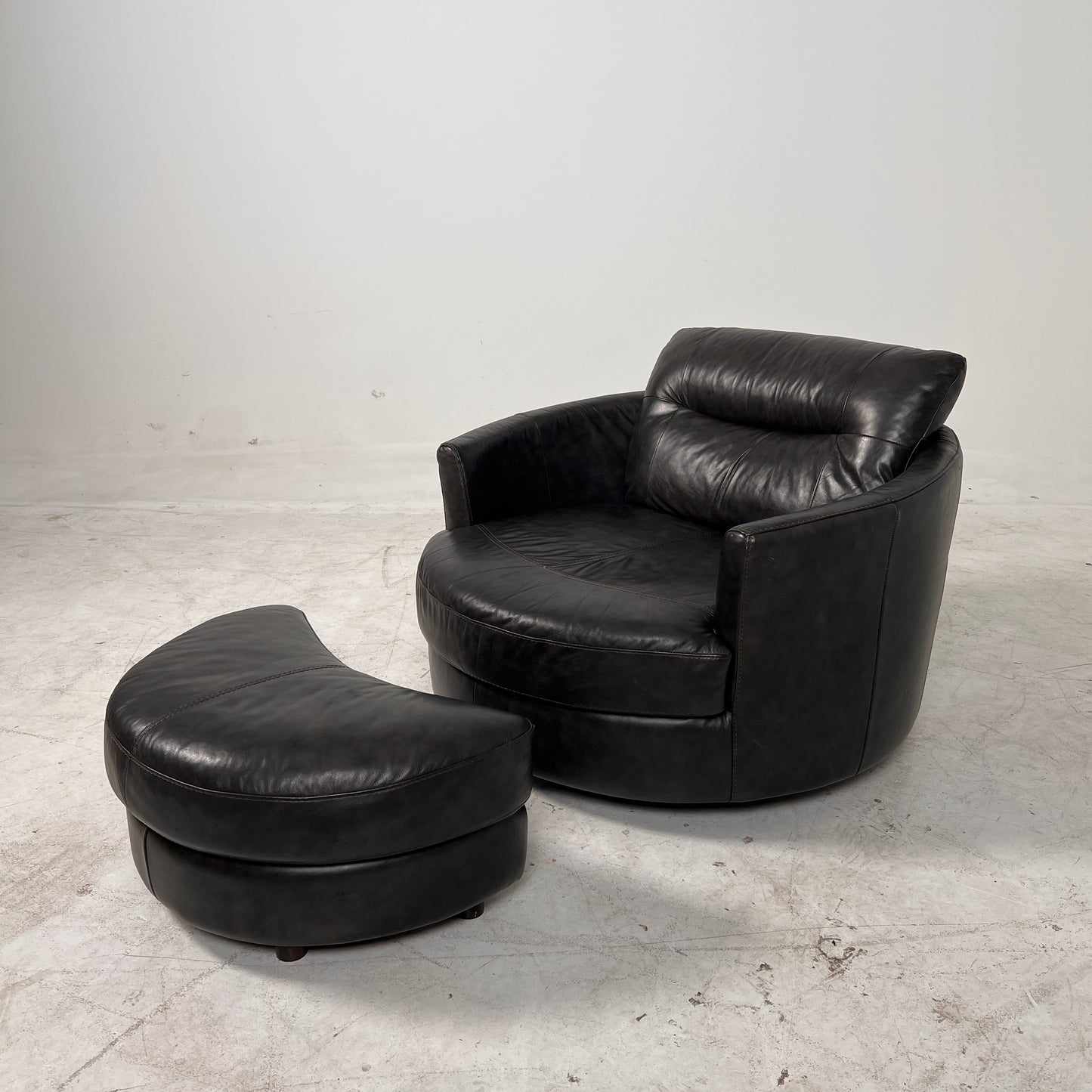 Urban Barn cuddler chair + ottoman. Leather round chair. Delivery available