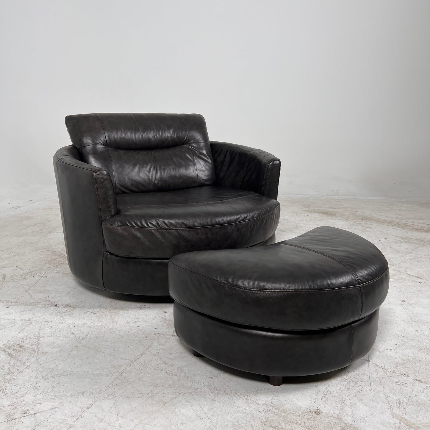 Urban Barn cuddler chair + ottoman. Leather round chair. Delivery available